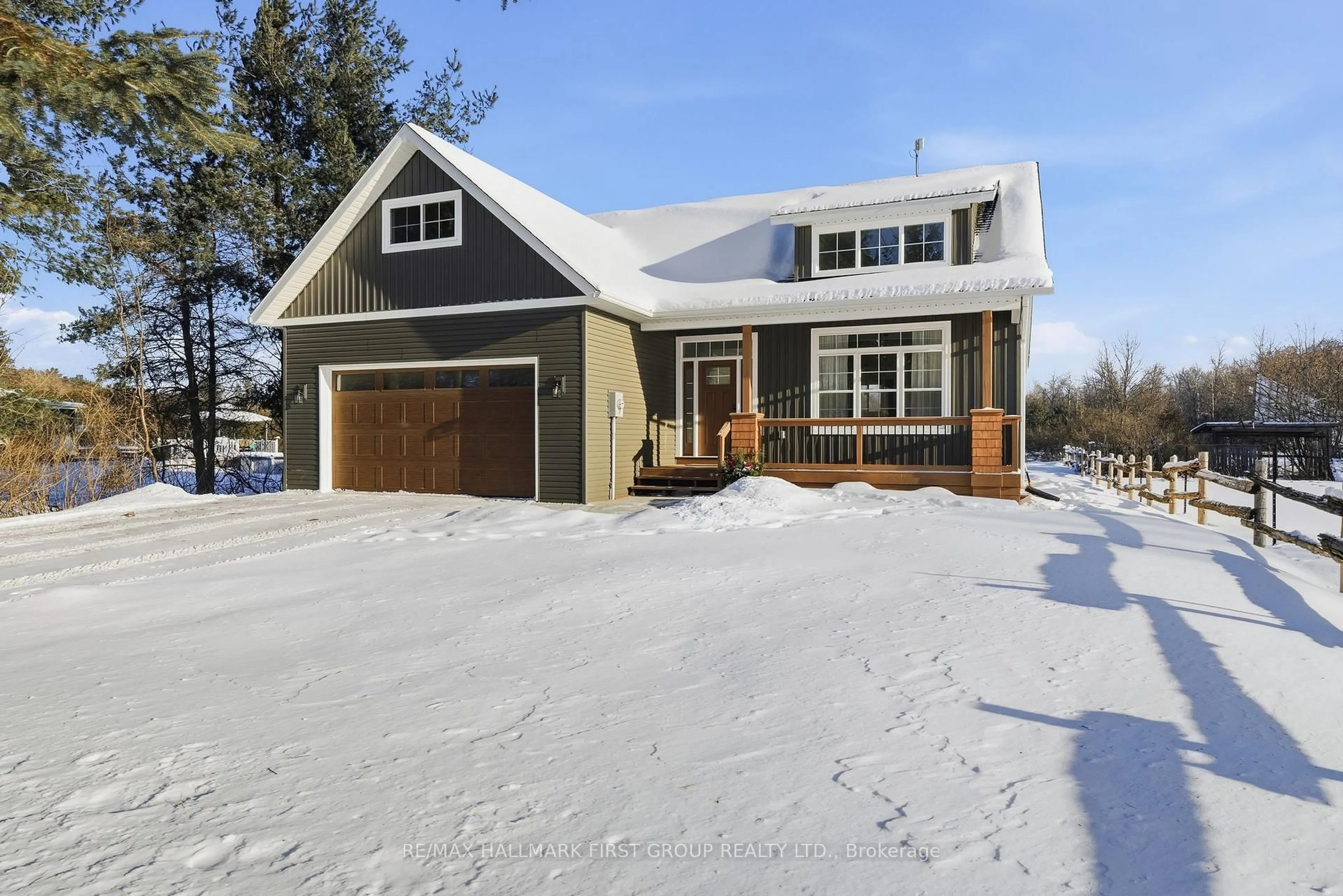 Home with vinyl exterior material, street for 145 Charles Rd, Tweed Ontario K0K 3J0