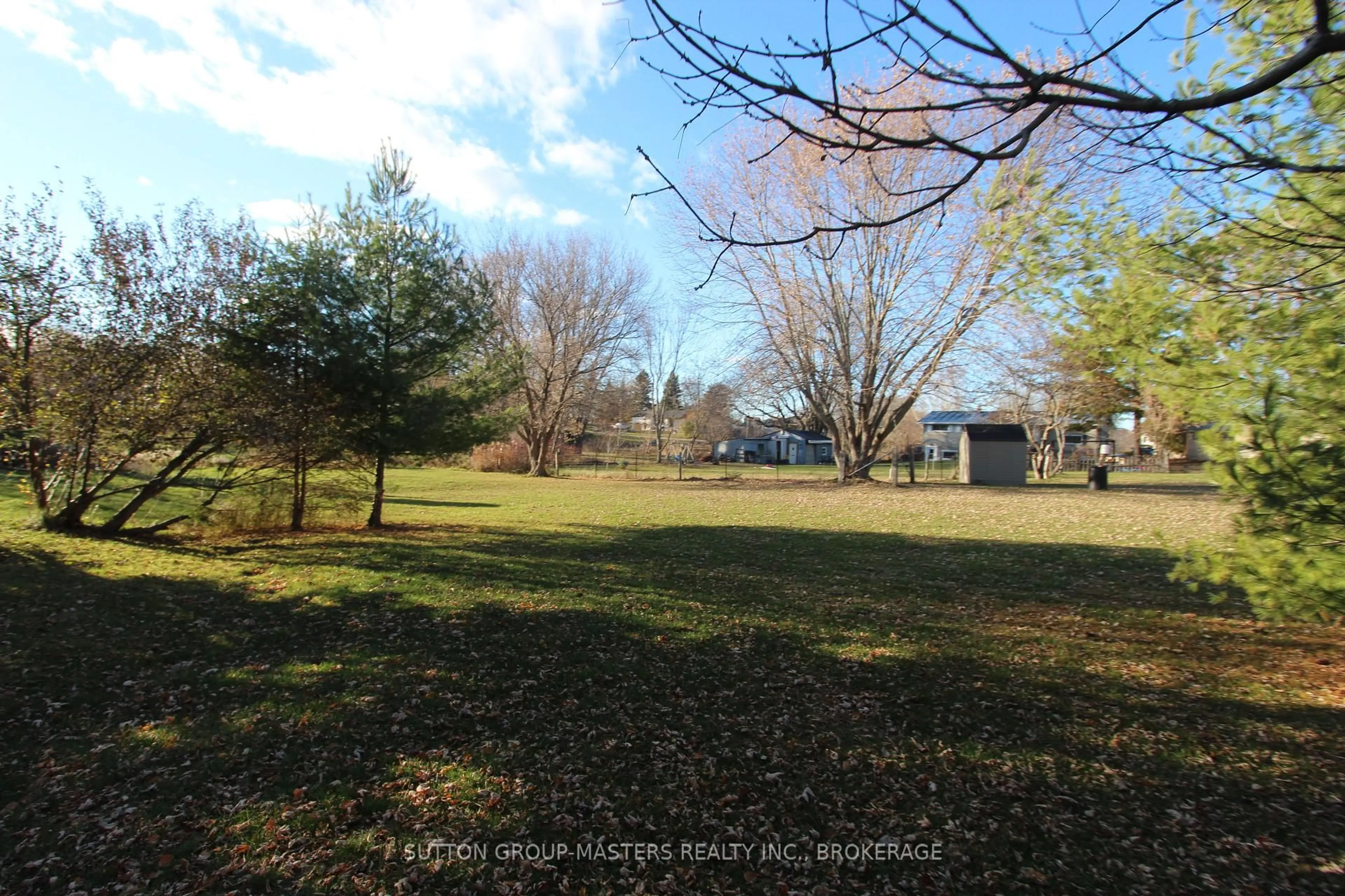 A pic from outside/outdoor area/front of a property/back of a property/a pic from drone, unknown for 304 Main St, Bath Ontario K0H 1G0