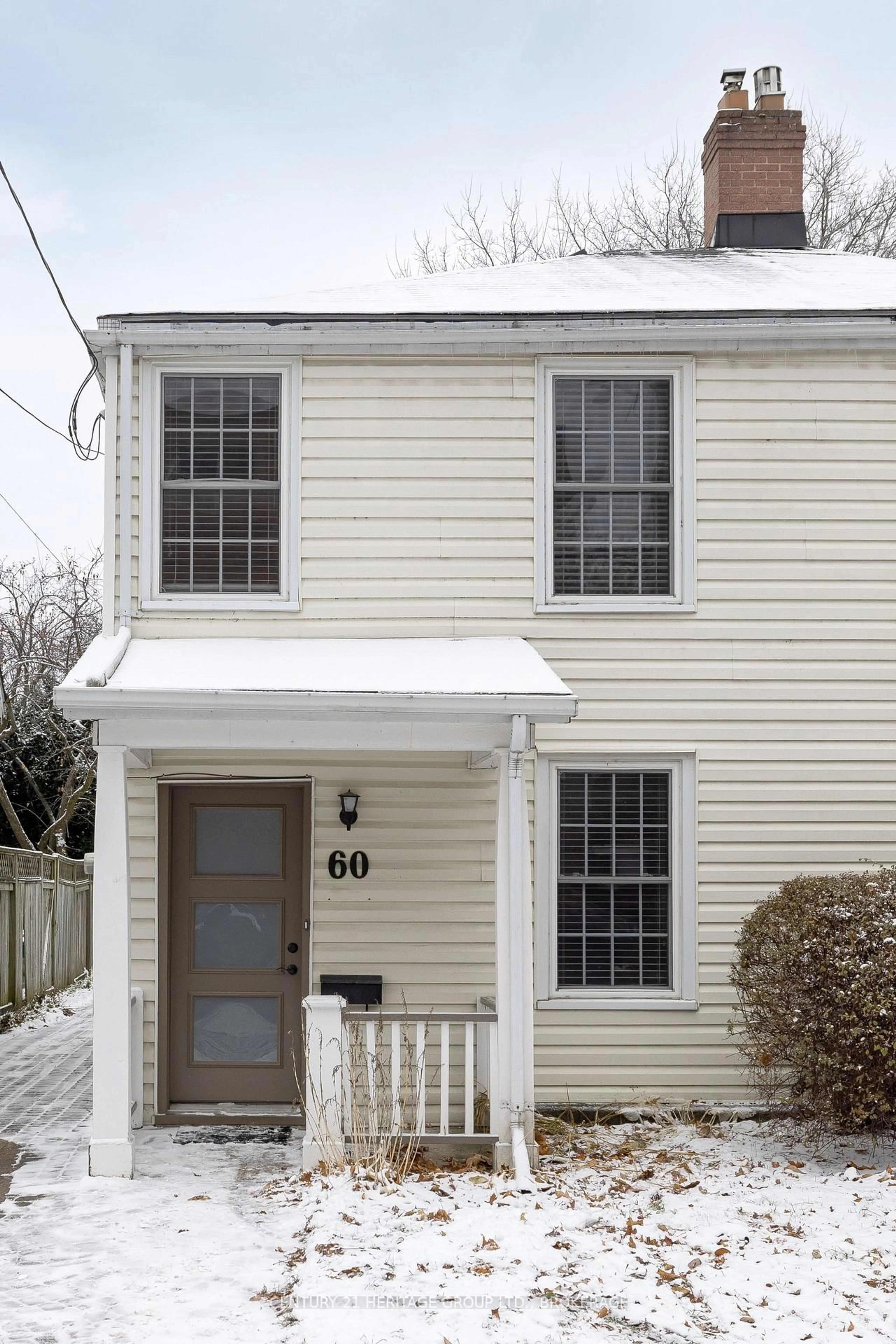 Home with vinyl exterior material, street for 60 Colborne St, Kingston Ontario K7K 1C6