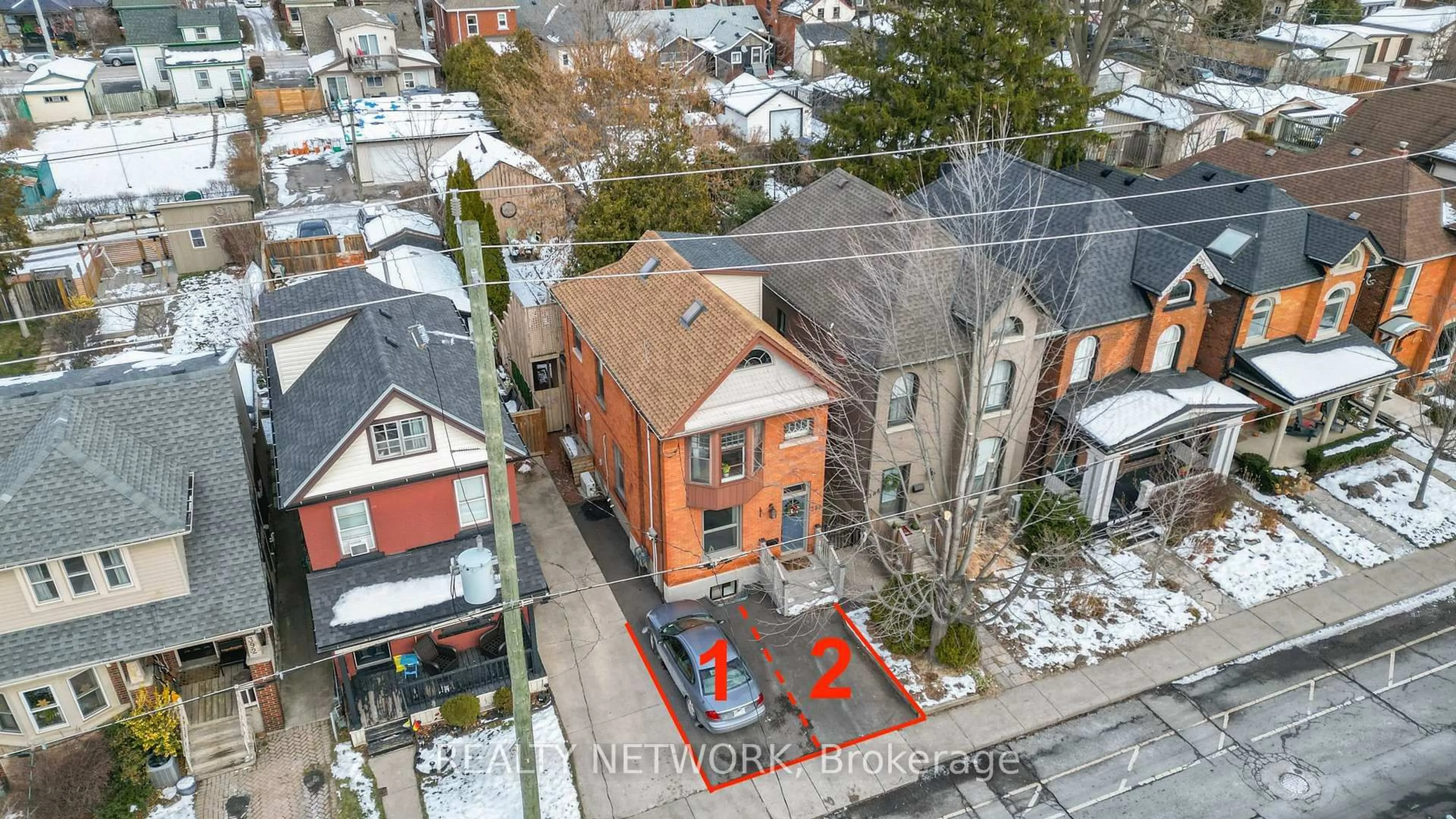 A pic from outside/outdoor area/front of a property/back of a property/a pic from drone, unknown for 388 Charlton Ave, Hamilton Ontario L8P 2E7
