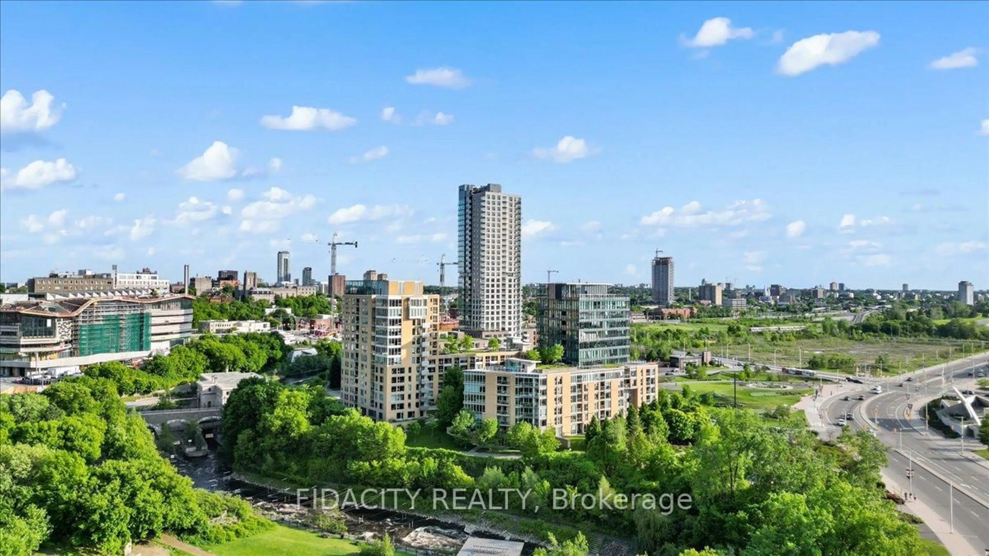 A pic from outside/outdoor area/front of a property/back of a property/a pic from drone, city buildings view from balcony for 200 Lett St #417, Ottawa Ontario K1R 0A7
