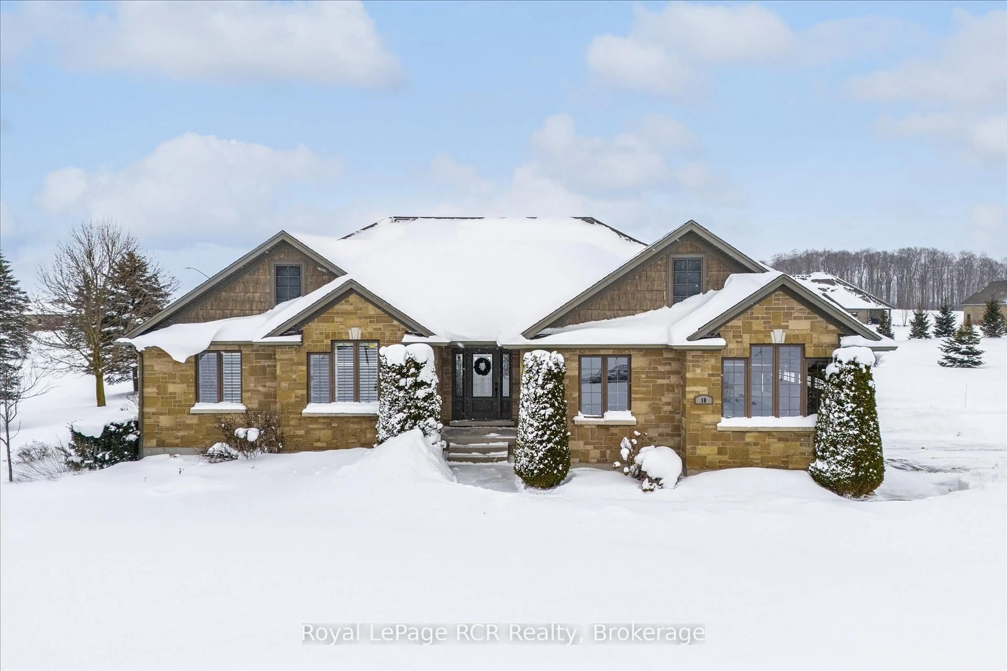 Home with brick exterior material, street for 10 Sparberry St, Southgate Ontario N0G 2L0