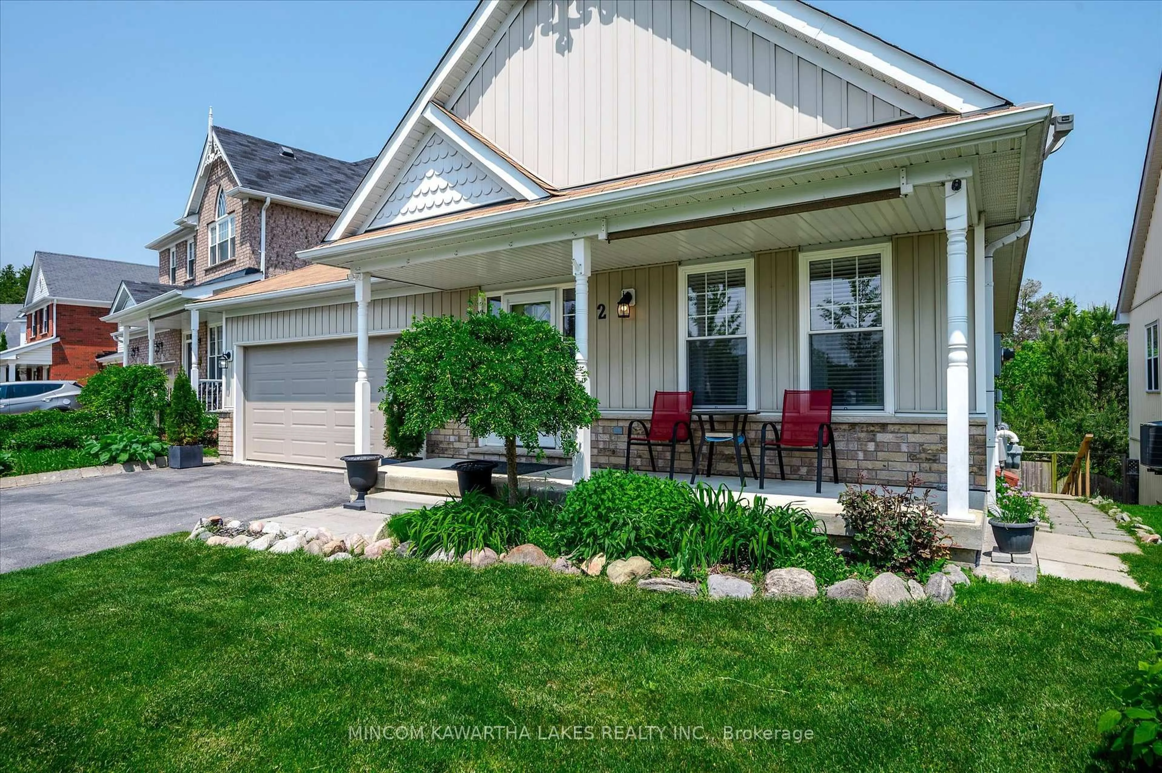 Home with vinyl exterior material, street for 2 Peace Cres, Peterborough Ontario K9H 0C1