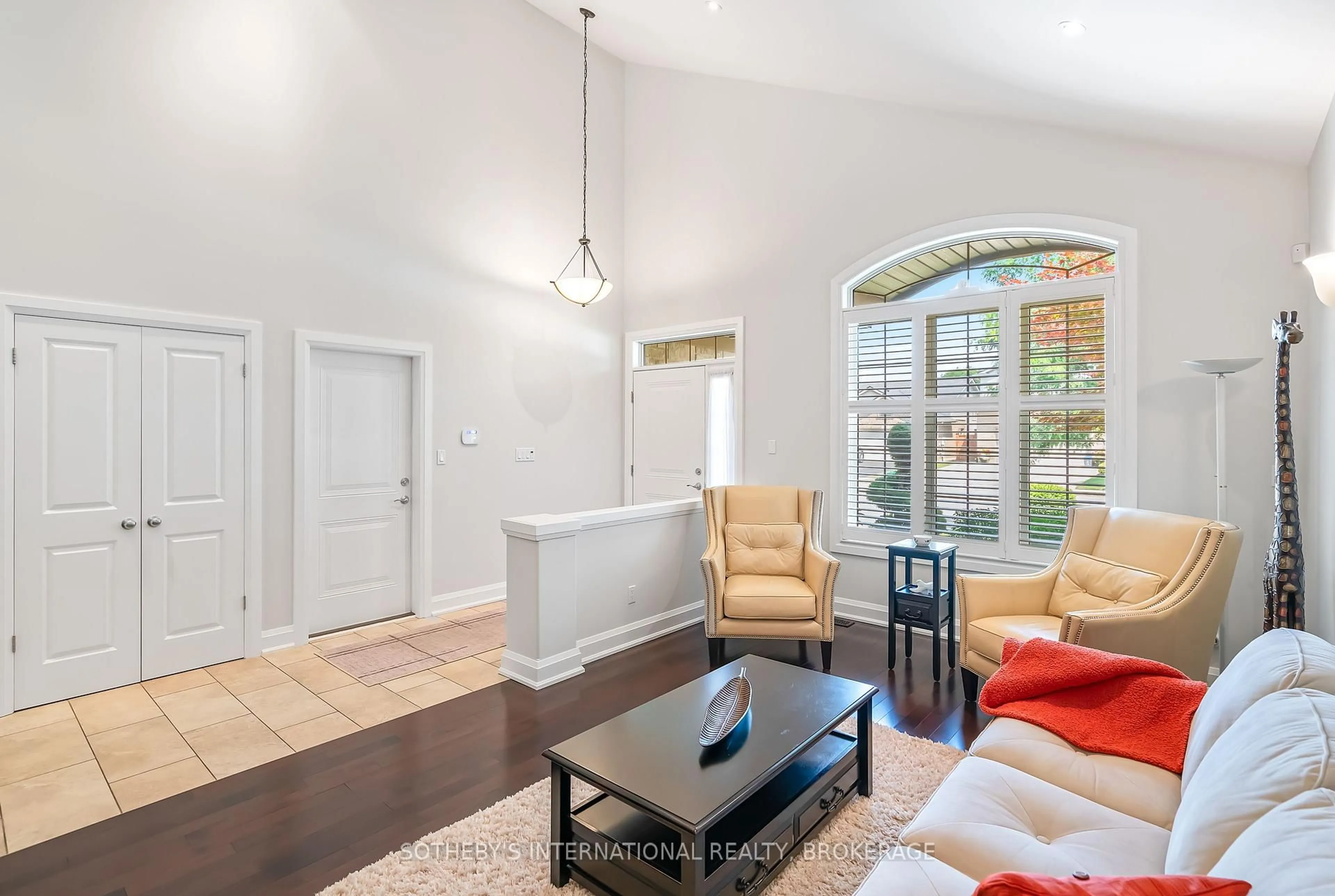 Living room with furniture, ceramic/tile floor for 8548 Forestview Blvd, Niagara Falls Ontario L2H 0B2