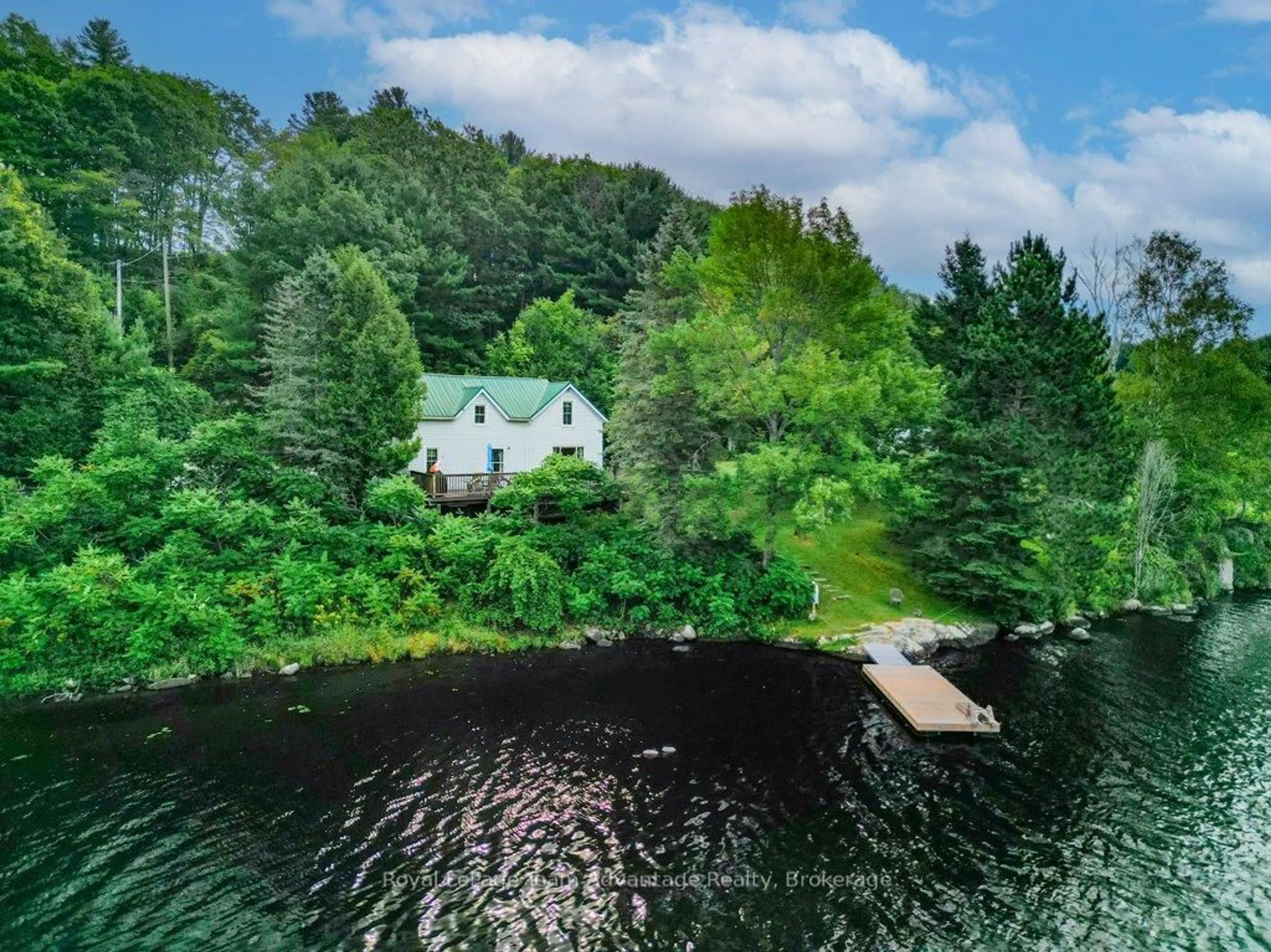 A pic from outside/outdoor area/front of a property/back of a property/a pic from drone, water/lake/river/ocean view for 27 BURNSIDE BRIDGE Rd, McDougall Ontario P2A 2W9