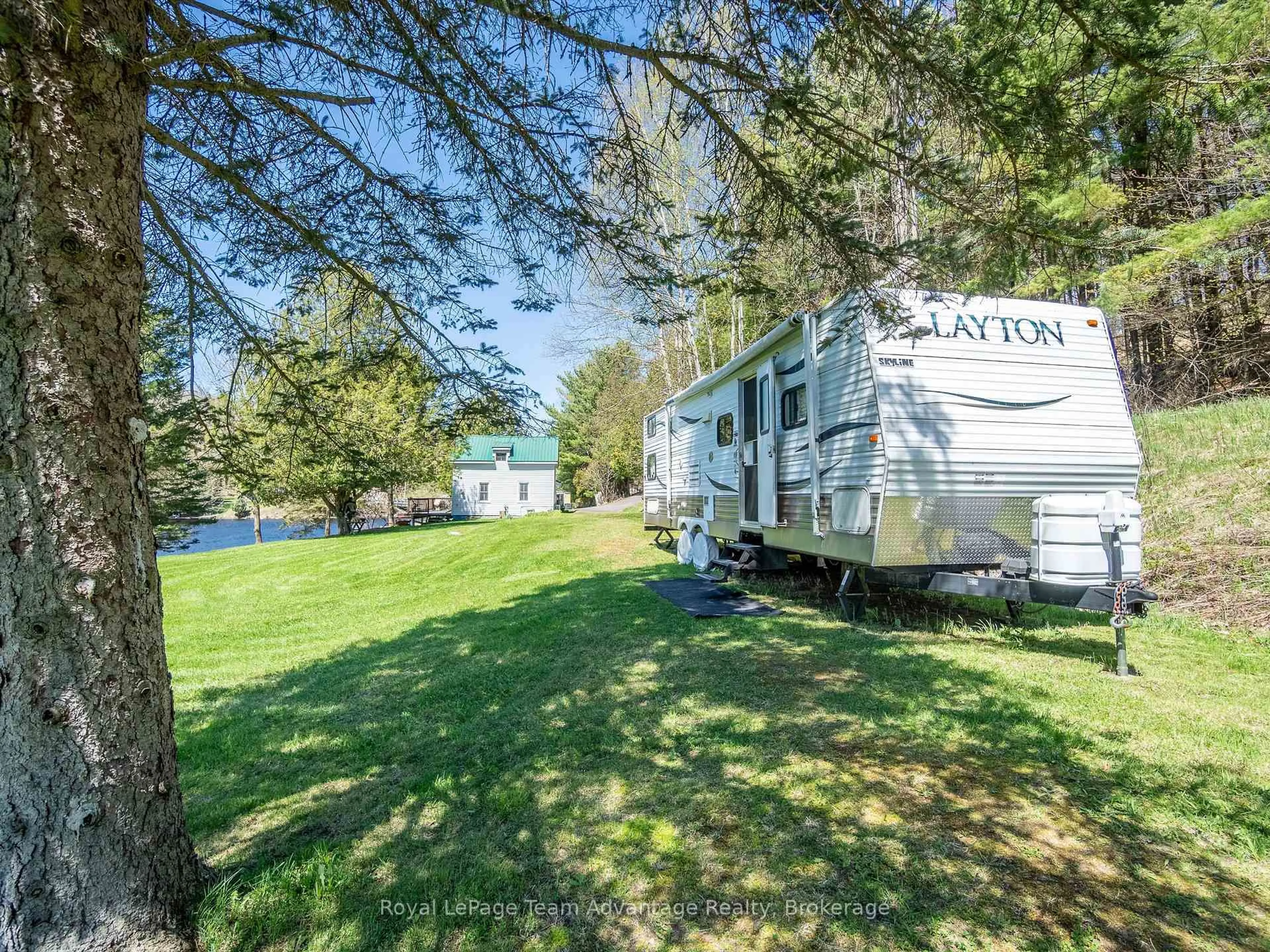 A pic from outside/outdoor area/front of a property/back of a property/a pic from drone, water/lake/river/ocean view for 27 BURNSIDE BRIDGE Rd, McDougall Ontario P2A 2W9