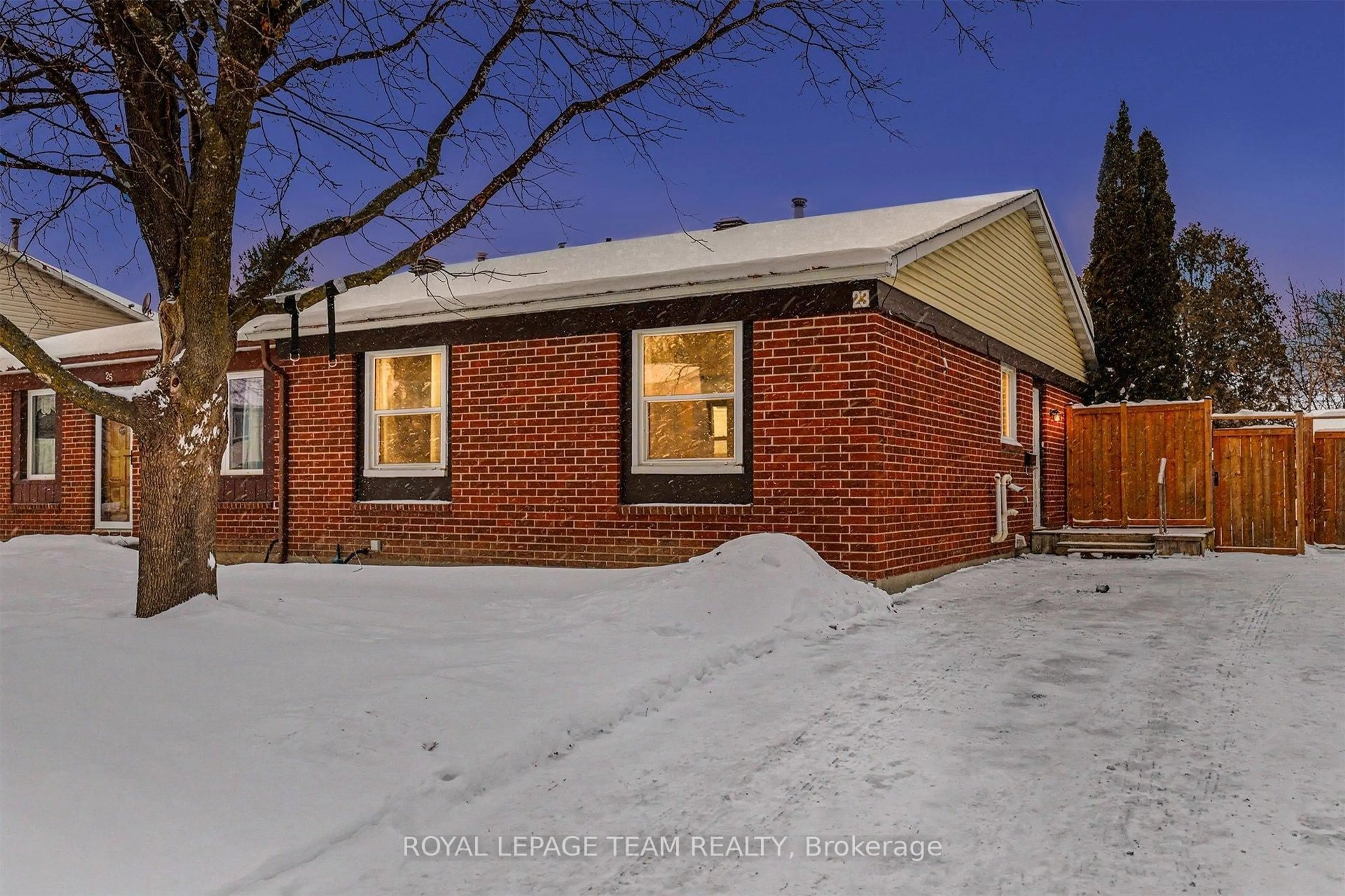 Home with brick exterior material, street for 23 Spearman Lane, Ottawa Ontario K2L 1Y6