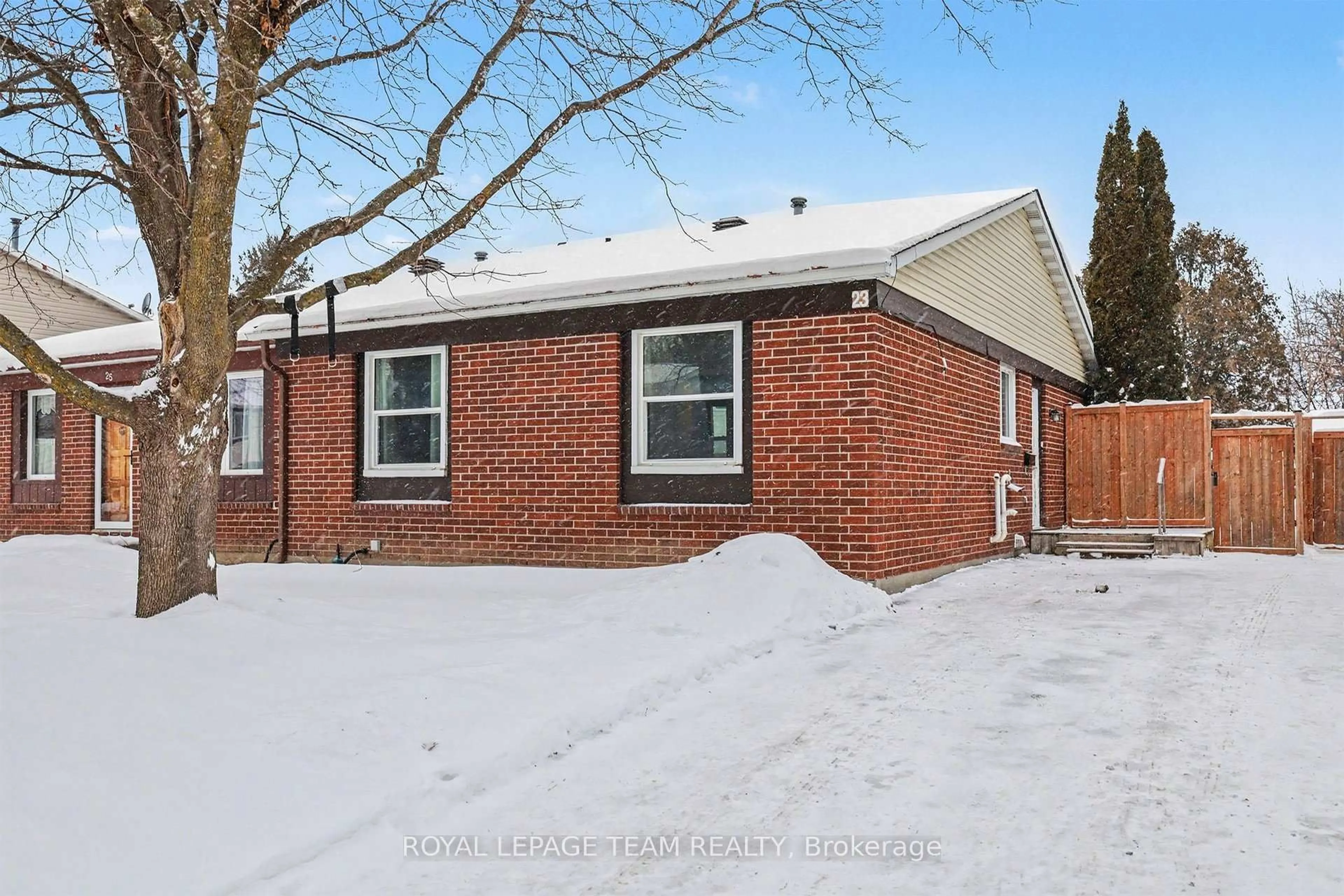 Home with brick exterior material, street for 23 Spearman Lane, Ottawa Ontario K2L 1Y6