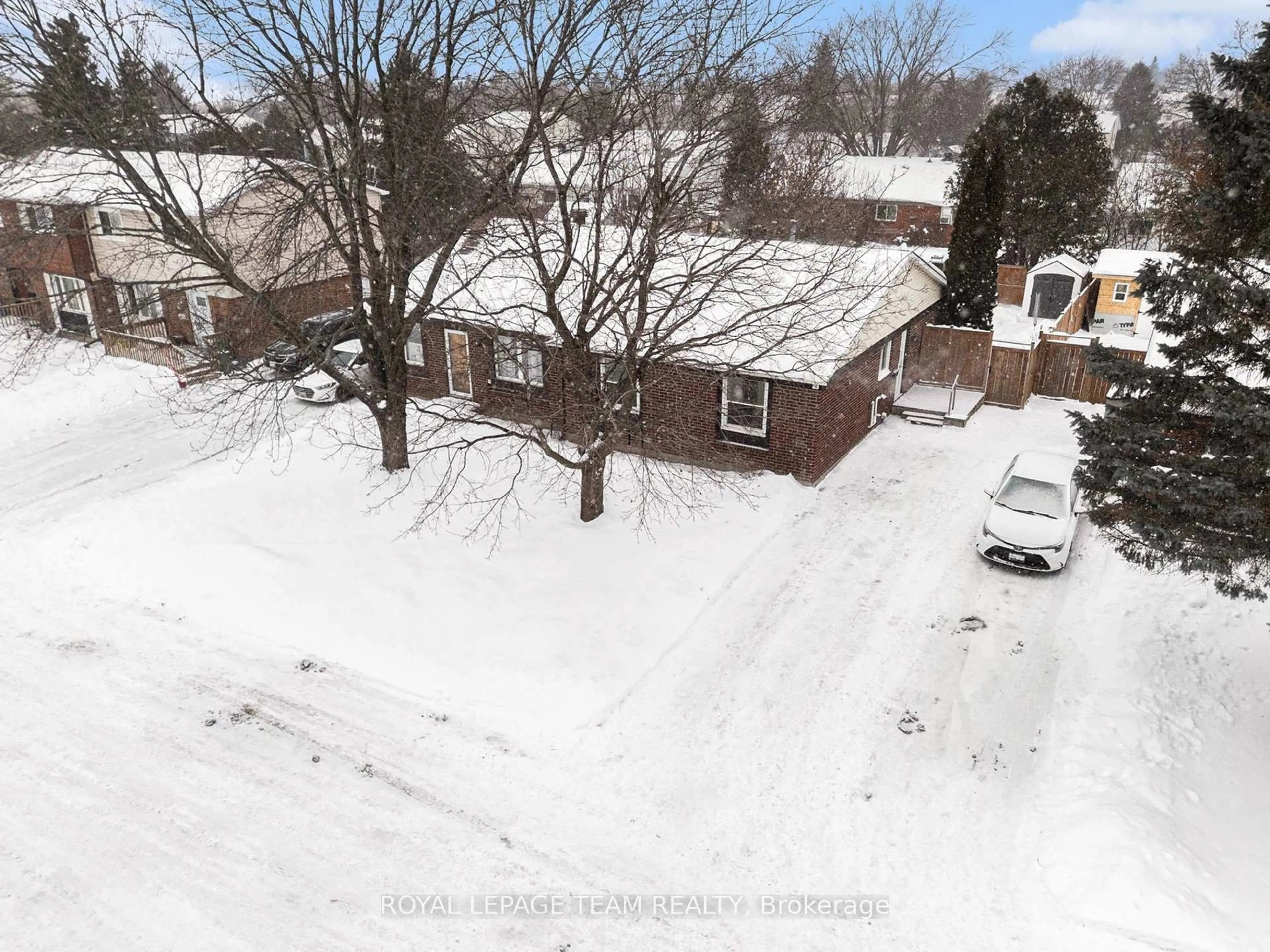 A pic from outside/outdoor area/front of a property/back of a property/a pic from drone, street for 23 Spearman Lane, Ottawa Ontario K2L 1Y6