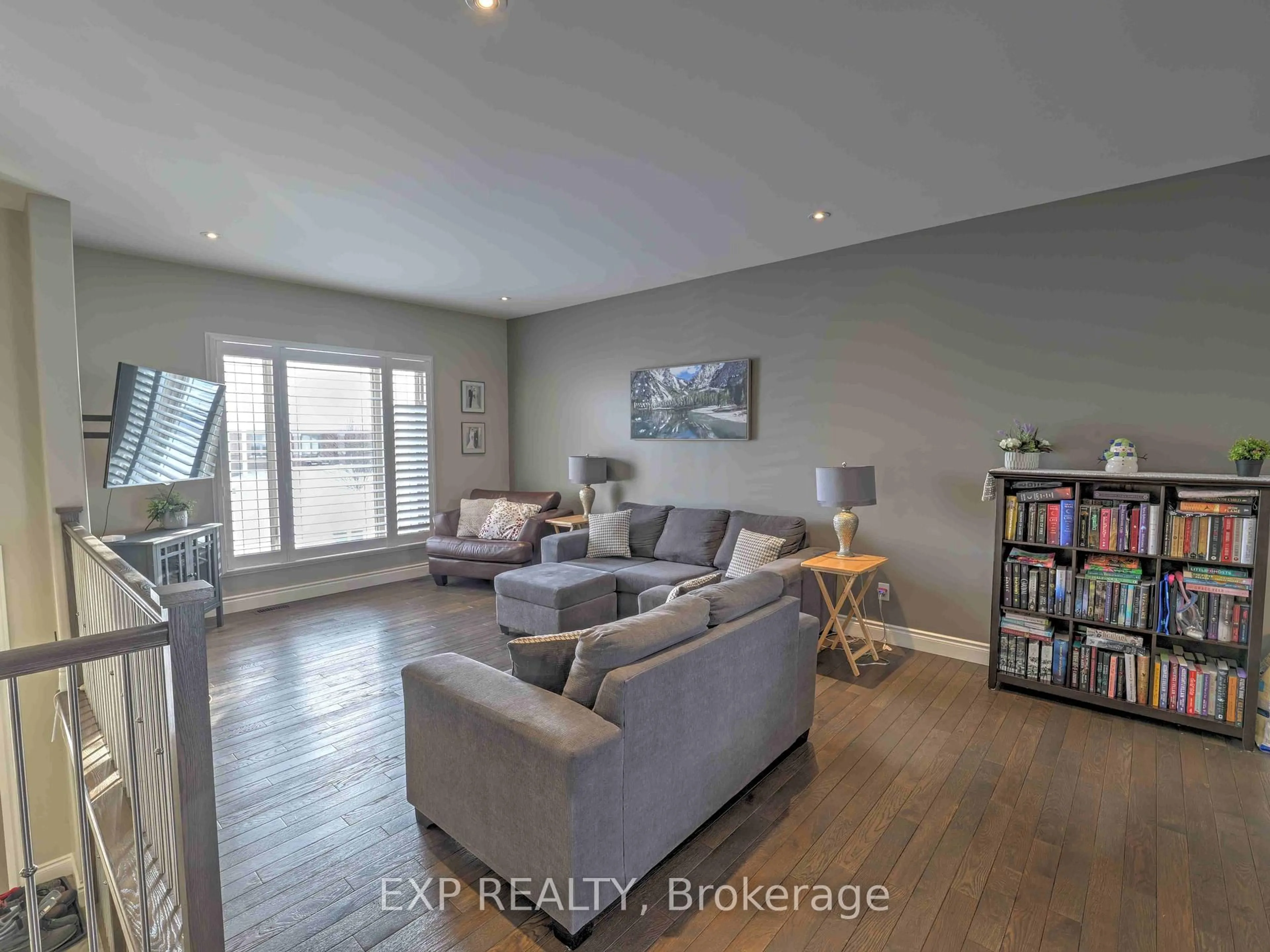 Living room with furniture, wood/laminate floor for 1093 Cloverdale Crt, Greater Sudbury Ontario P0M 1E0