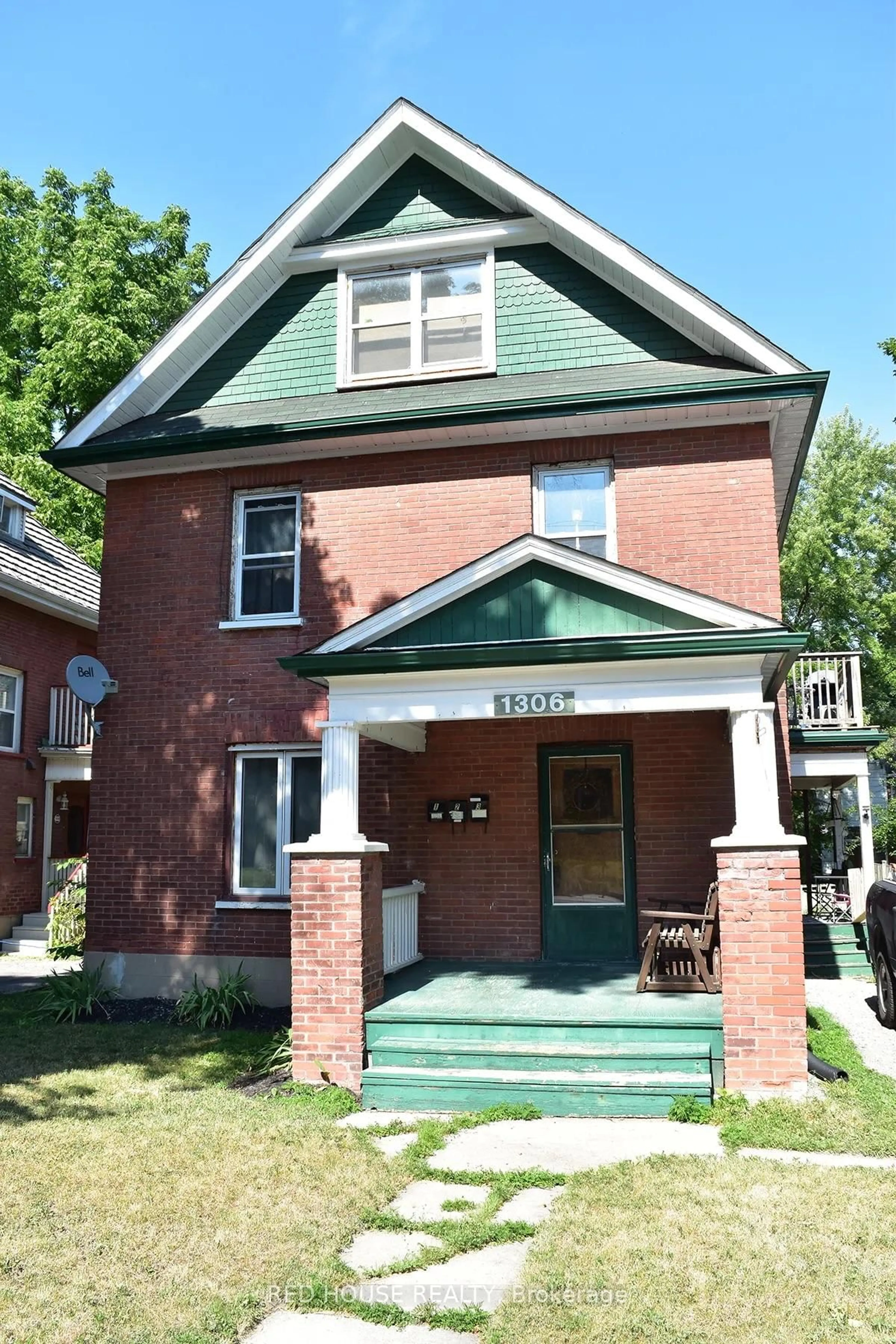 Home with brick exterior material, street for 1306 Monaghan Rd, Peterborough Ontario K9J 5M1