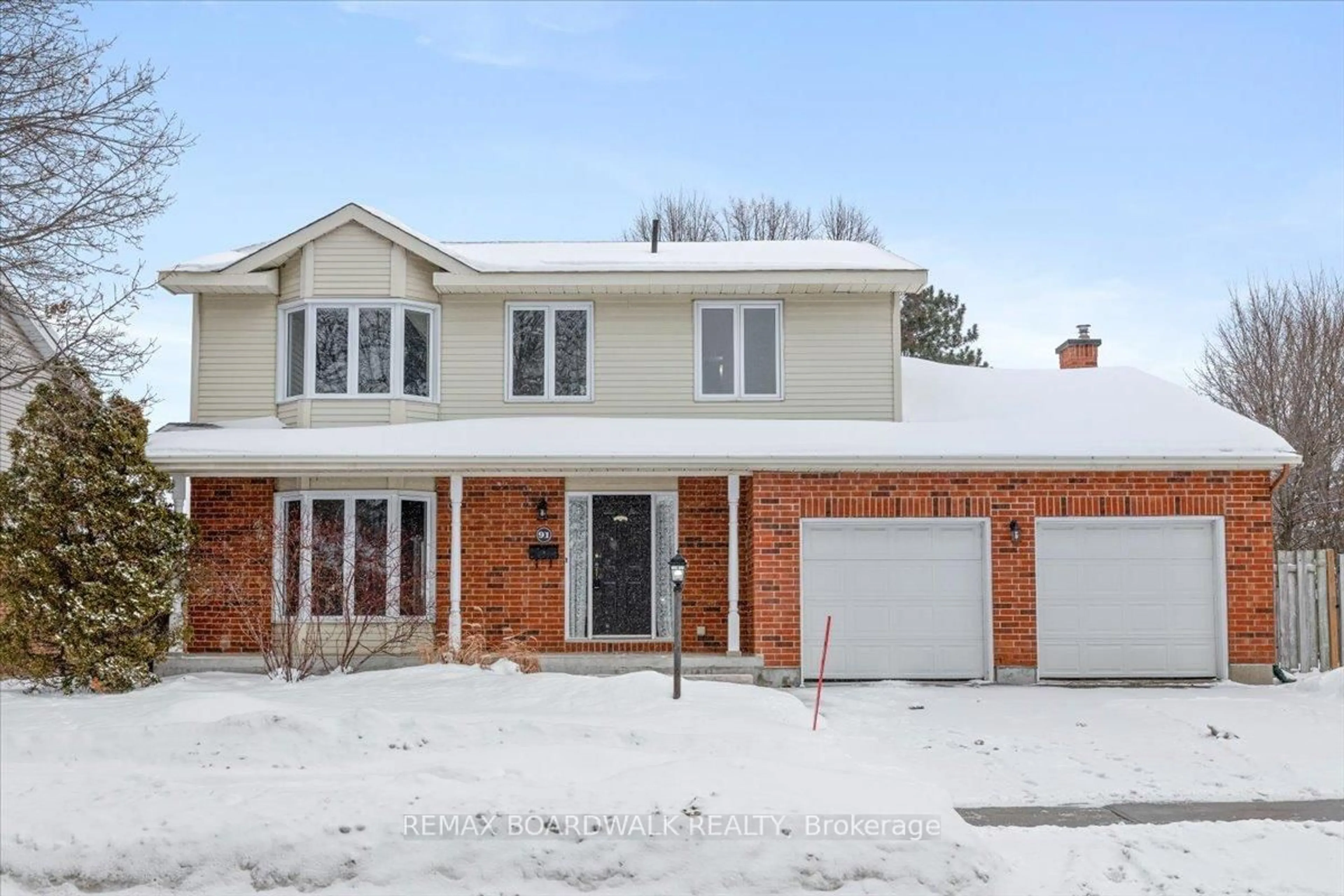 Home with brick exterior material, street for 91 Mccurdy Dr, Kanata Ontario K2L 2N6