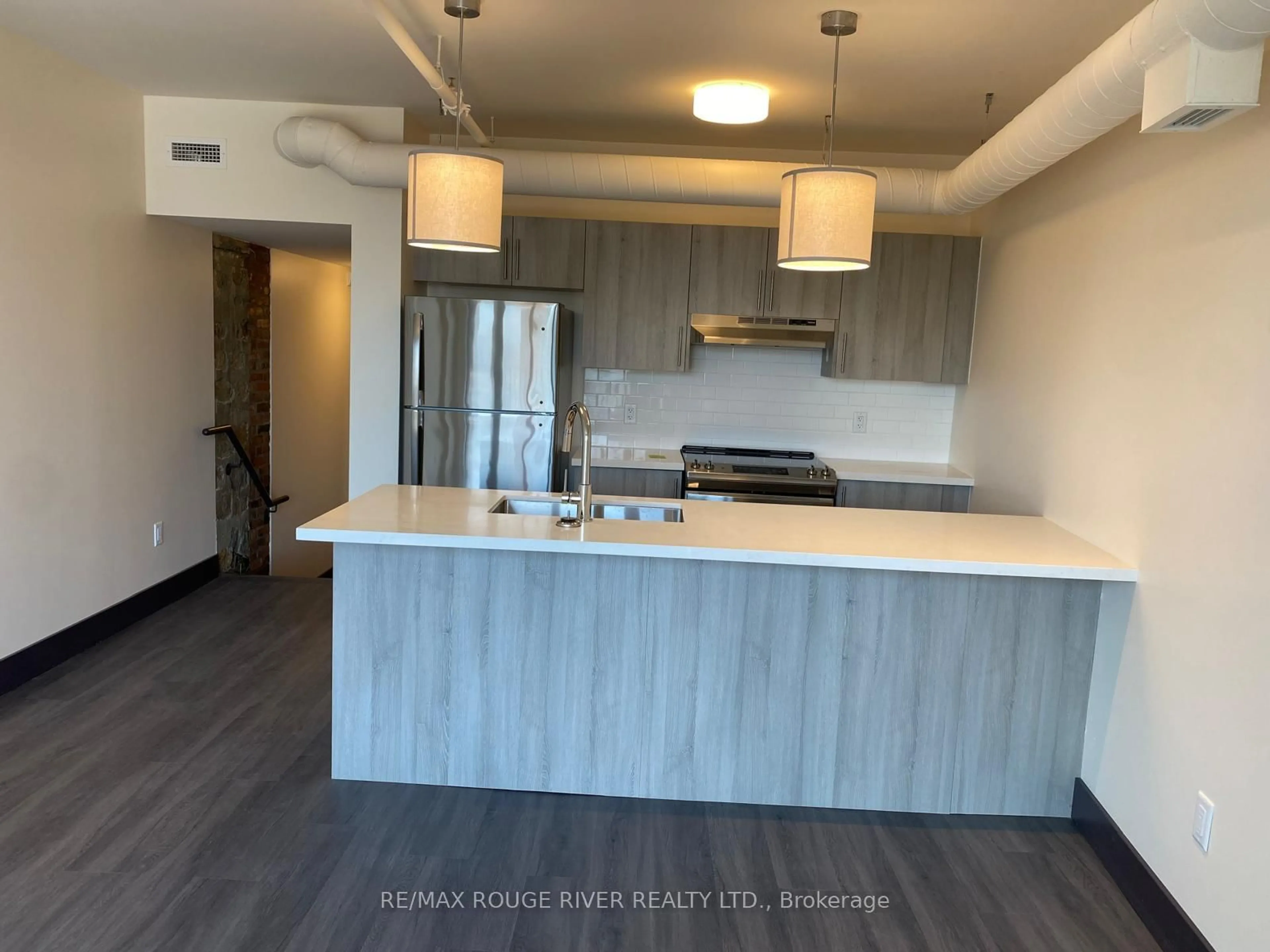 Open concept kitchen, unknown for 121 King St #408, Hamilton Ontario L8N 1A9