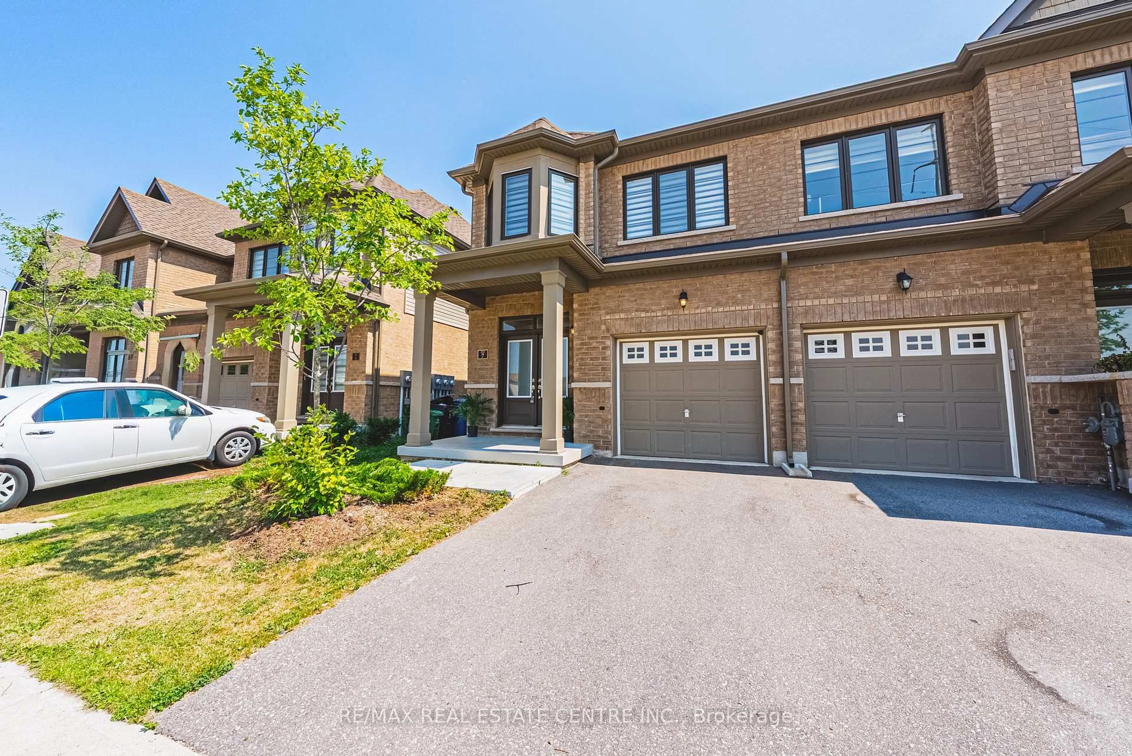 Home with brick exterior material, street for 166 Deerpath Dr #7, Guelph Ontario N1K 0E2
