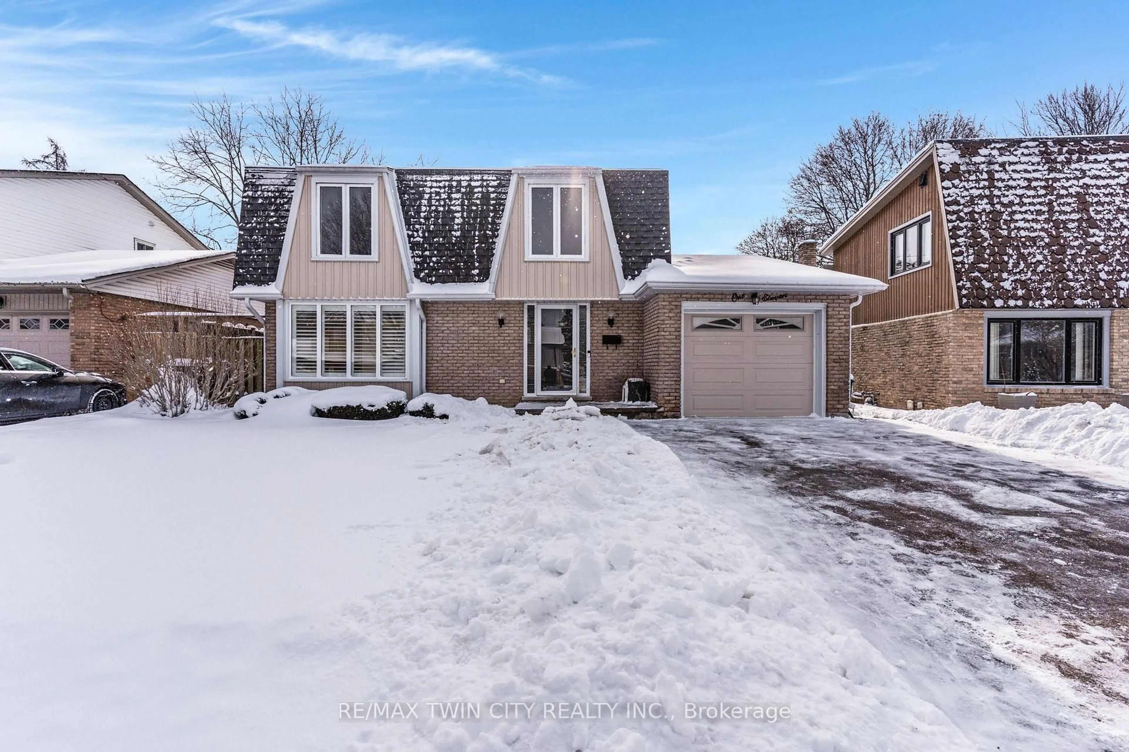 Home with brick exterior material, street for 111 Manor Dr, Kitchener Ontario N2A 2T9