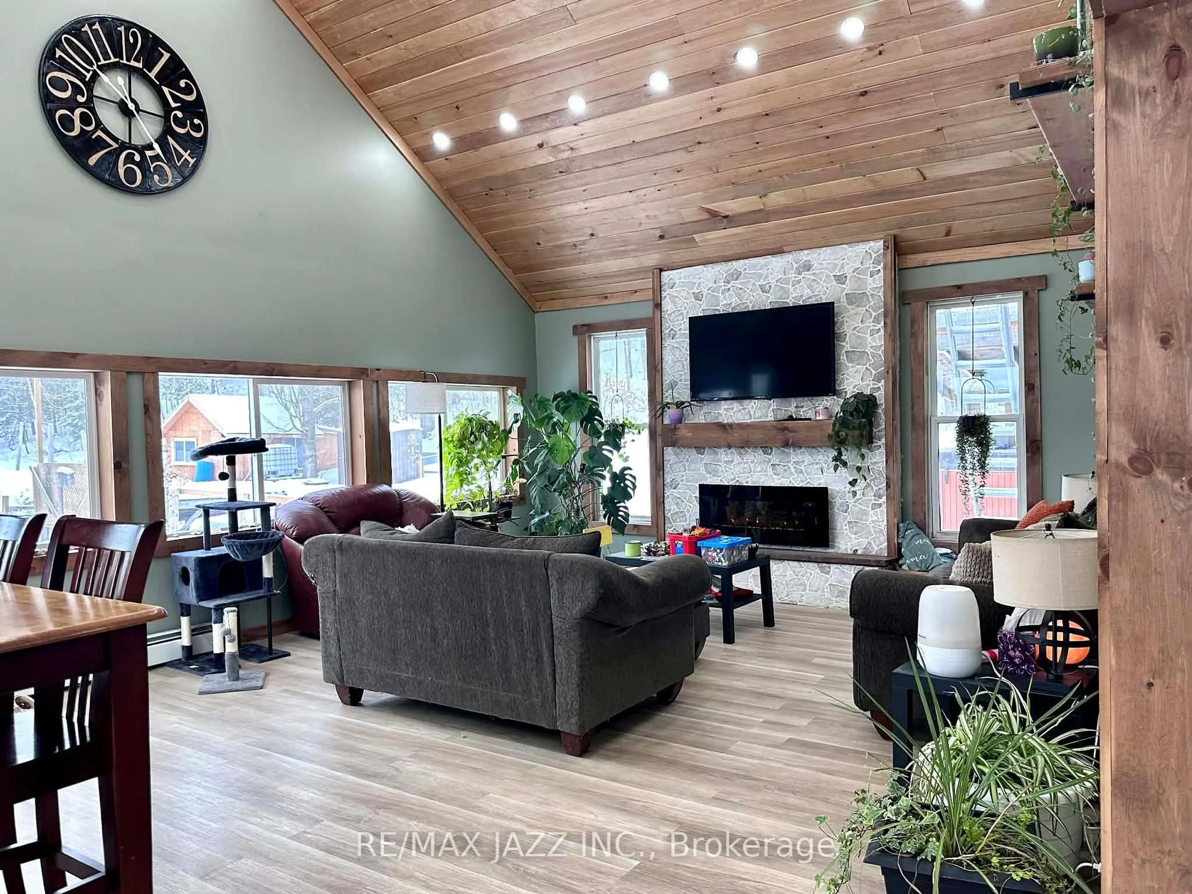 Living room with furniture, wood/laminate floor for 22 Elizabeth Crt, Hastings Ontario K0L 1W0