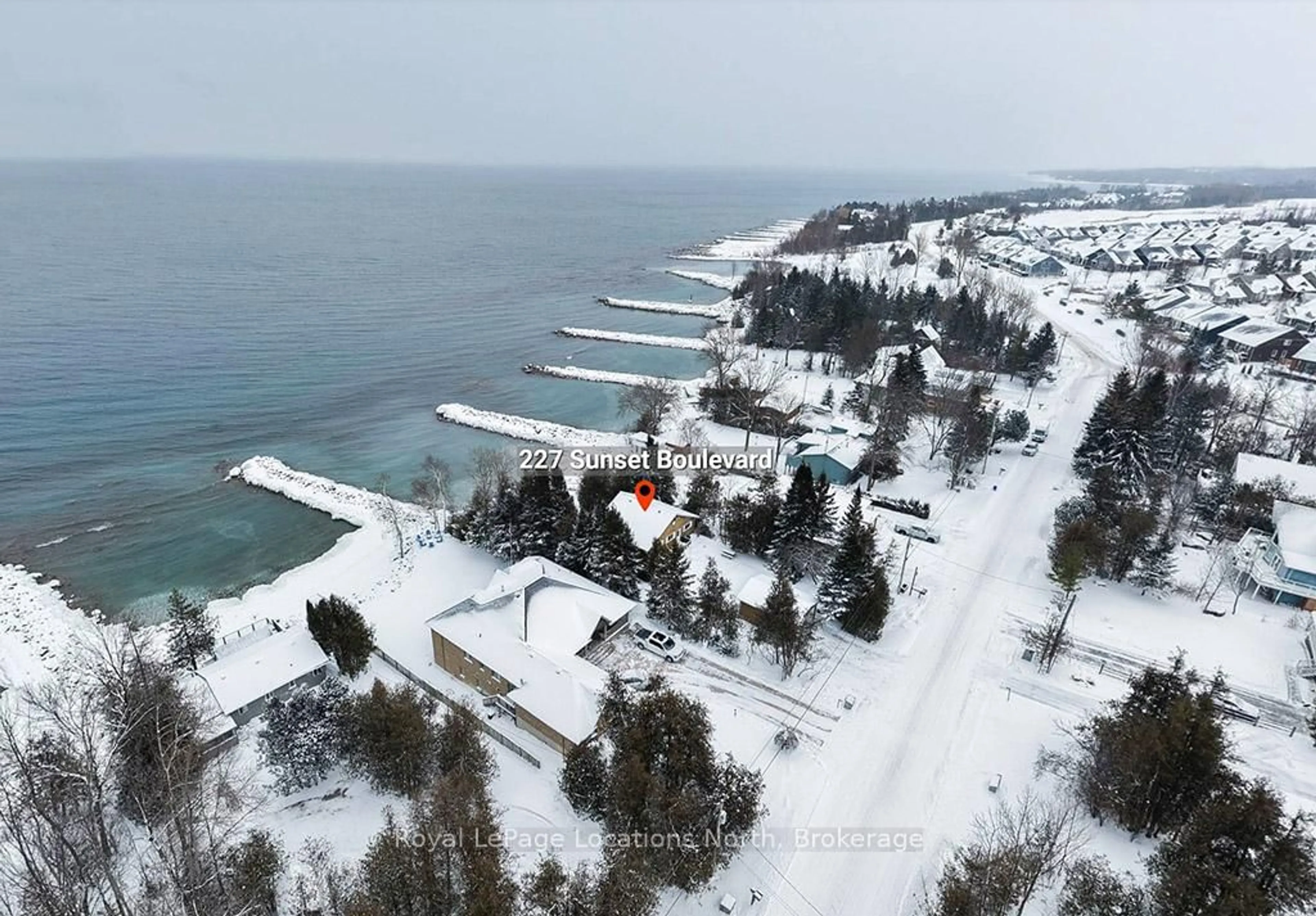 A pic from outside/outdoor area/front of a property/back of a property/a pic from drone, water/lake/river/ocean view for 227 Sunset Blvd, Blue Mountains Ontario N0H 2P0