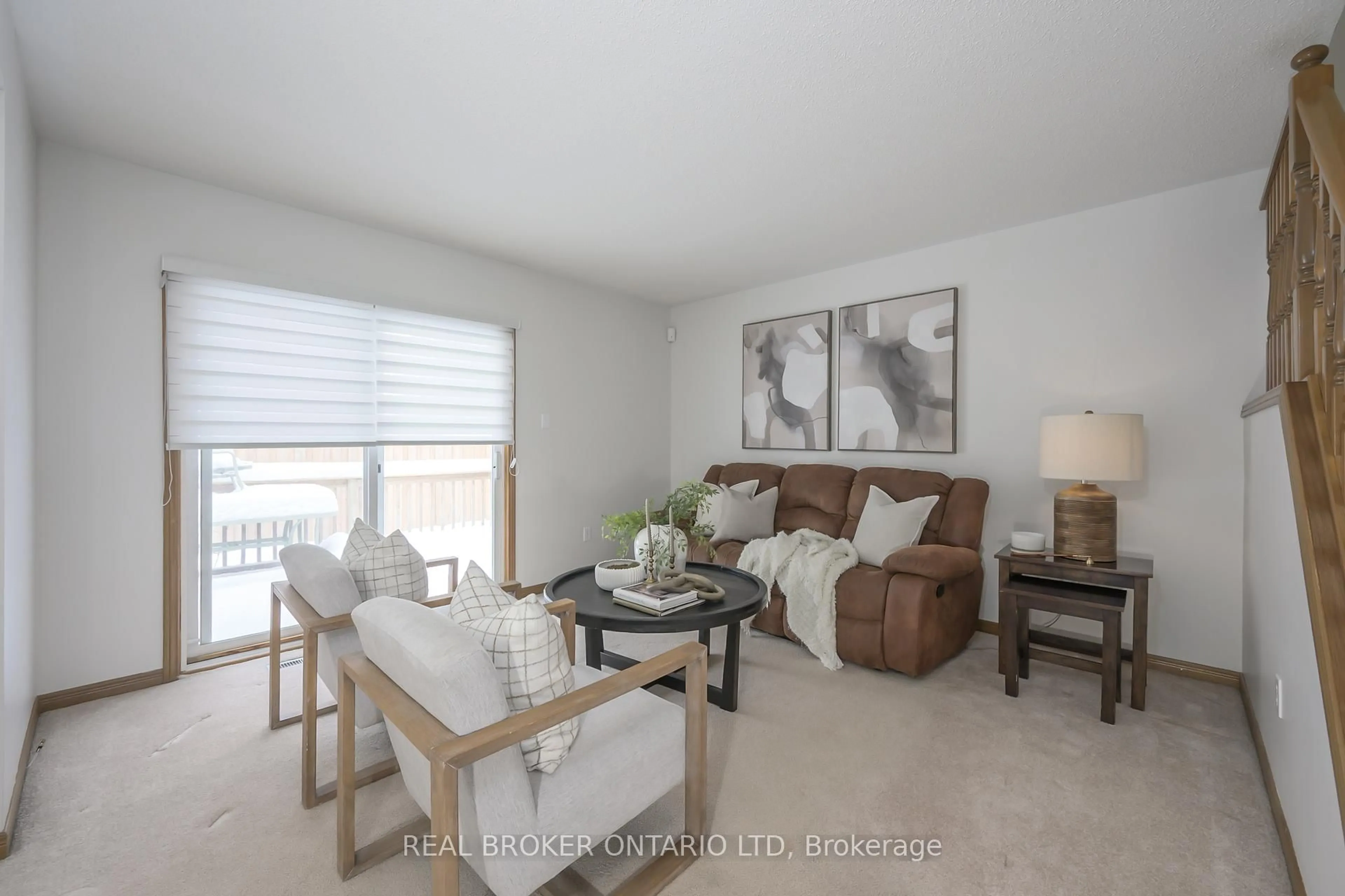 Living room with furniture, wood/laminate floor for 195 Barker St #4, London East Ontario N5Y 1Y2