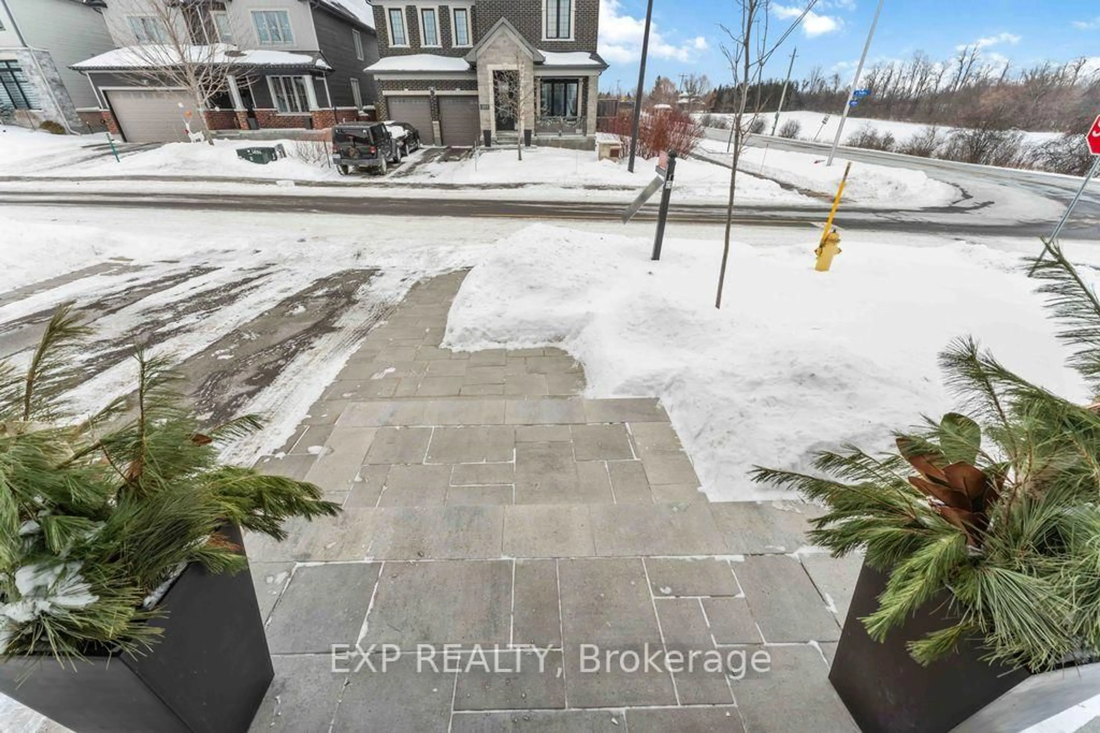 A pic from outside/outdoor area/front of a property/back of a property/a pic from drone, street for 396 Trestle St, Manotick Ontario K4M 0G4