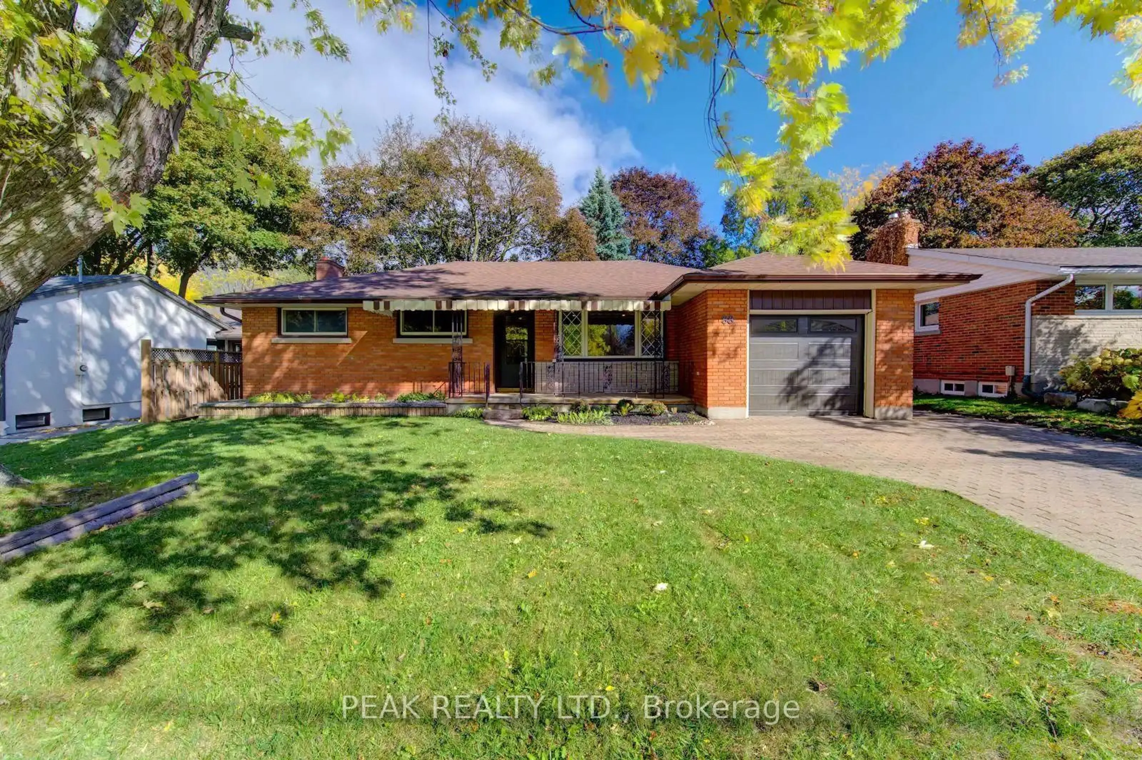 Home with brick exterior material, street for 88 Ellis Cres, Waterloo Ontario N2J 2B8