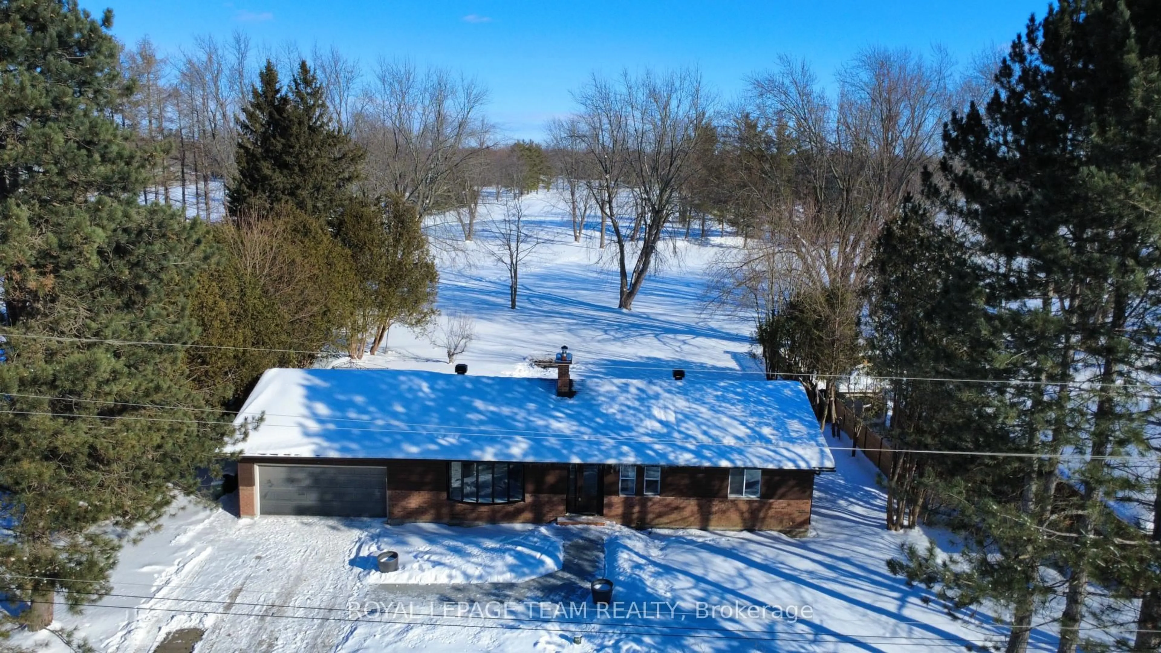 A pic from outside/outdoor area/front of a property/back of a property/a pic from drone, unknown for 6636 Marina Dr, Manotick Ontario K4M 1B3