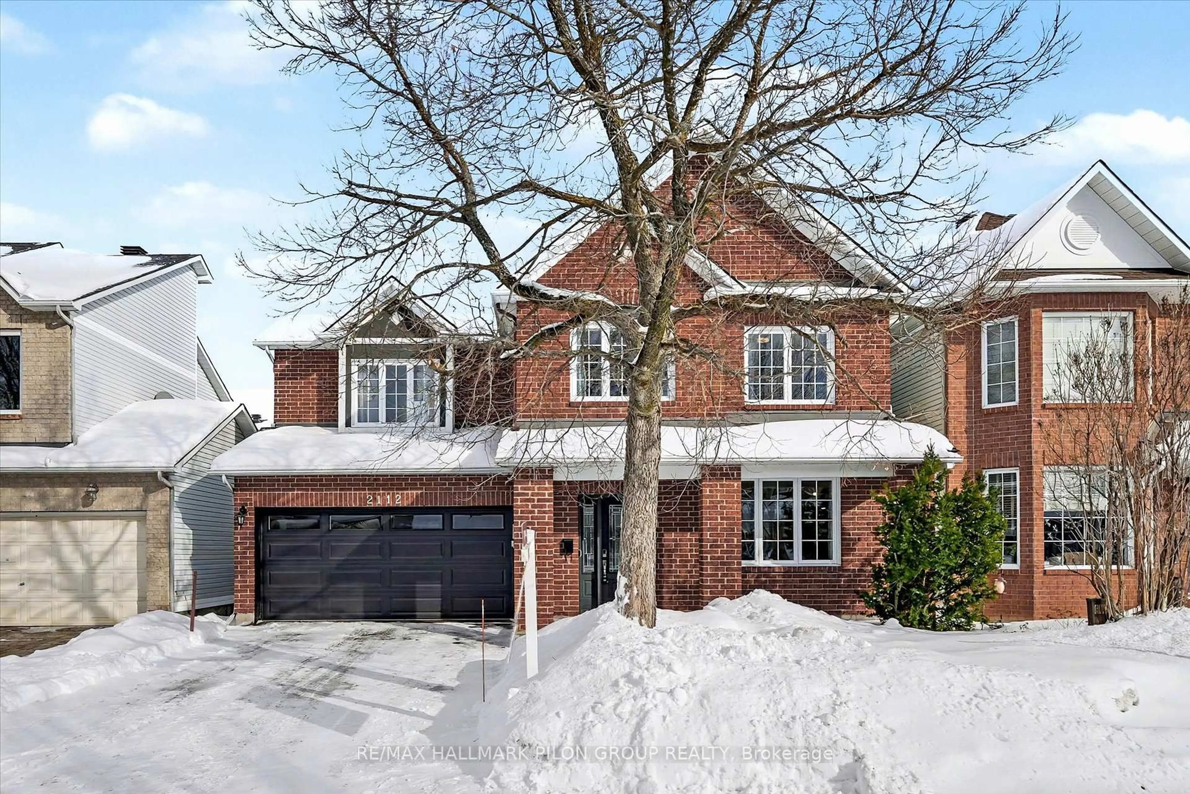 Home with brick exterior material, street for 2112 Sandy Oaks Dr, Ottawa Ontario K1W 1H6