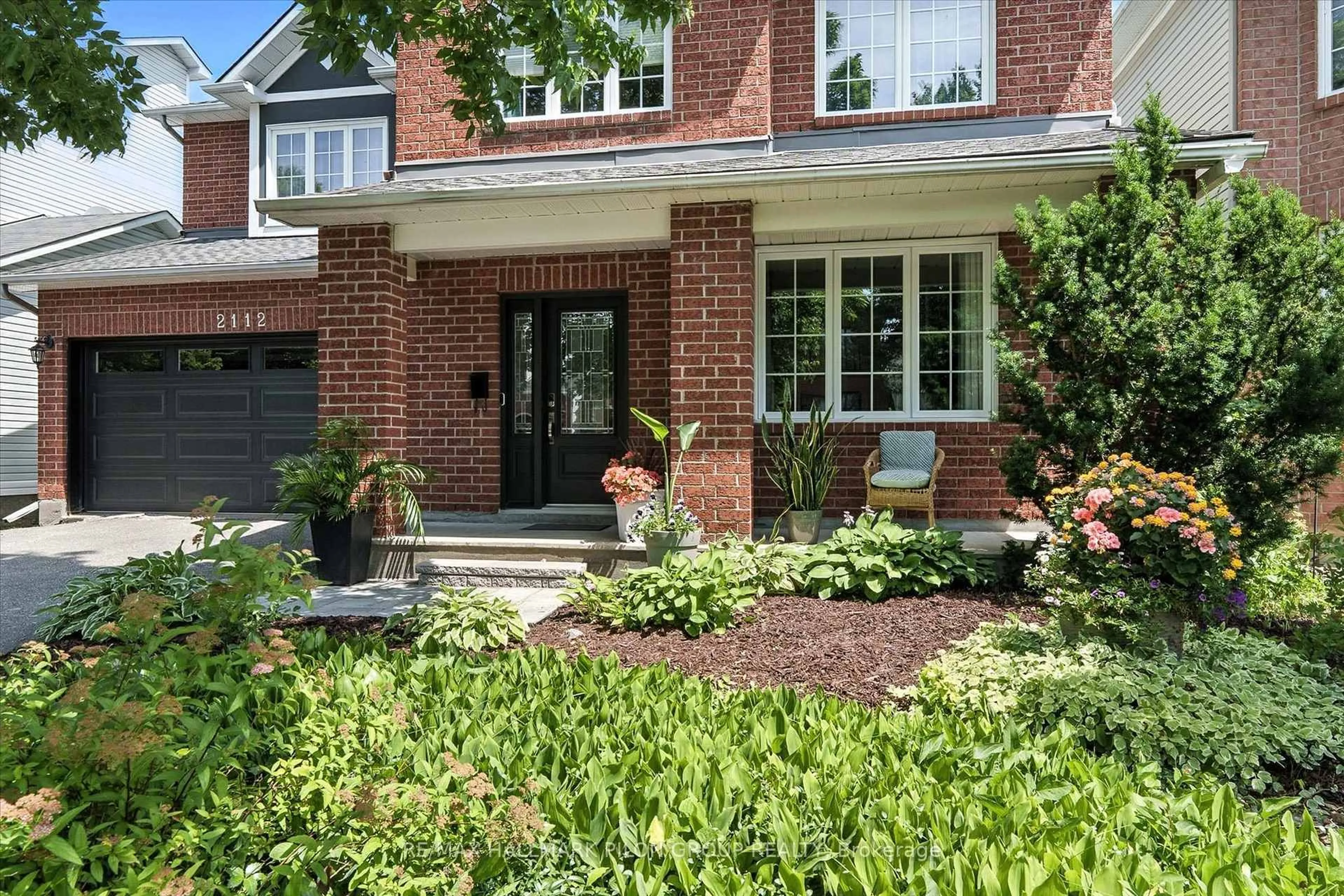 Home with brick exterior material, street for 2112 Sandy Oaks Dr, Ottawa Ontario K1W 1H6