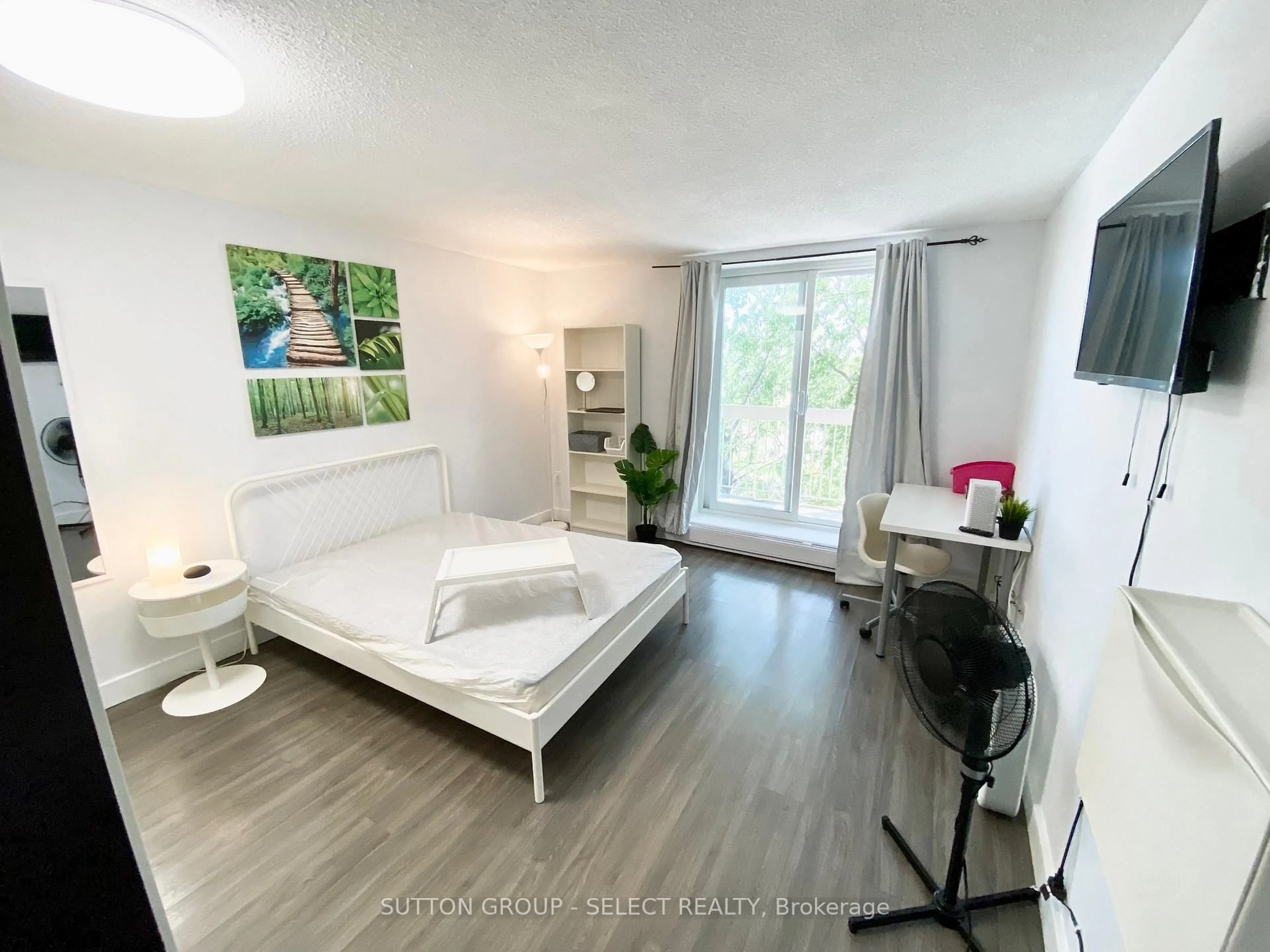 Bedroom with bed, wood/laminate floor for 626 First St #505, London East Ontario N5V 2A2