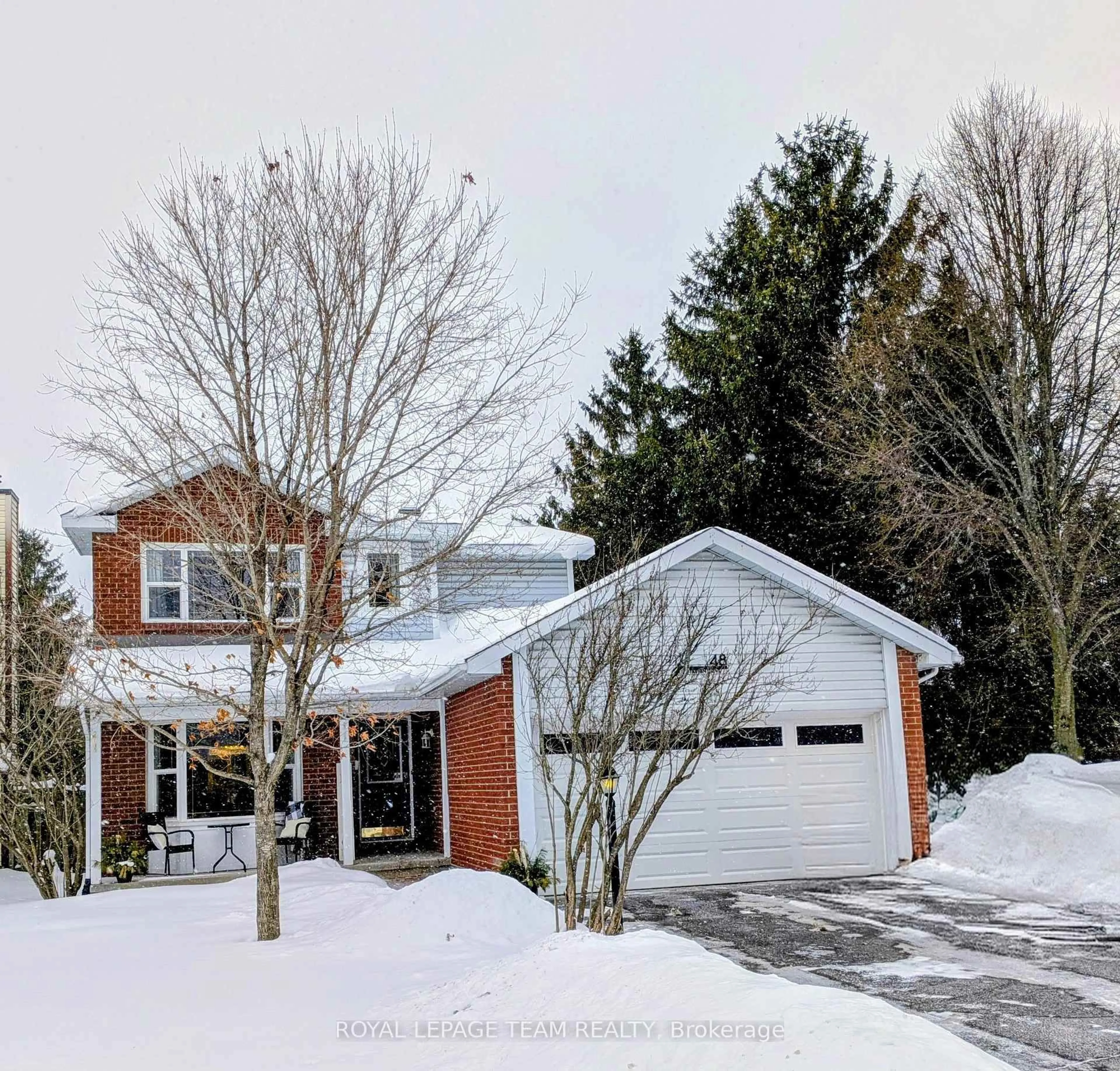 Home with brick exterior material, street for 48 Tartan Dr, Barrhaven Ontario K2J 2V5