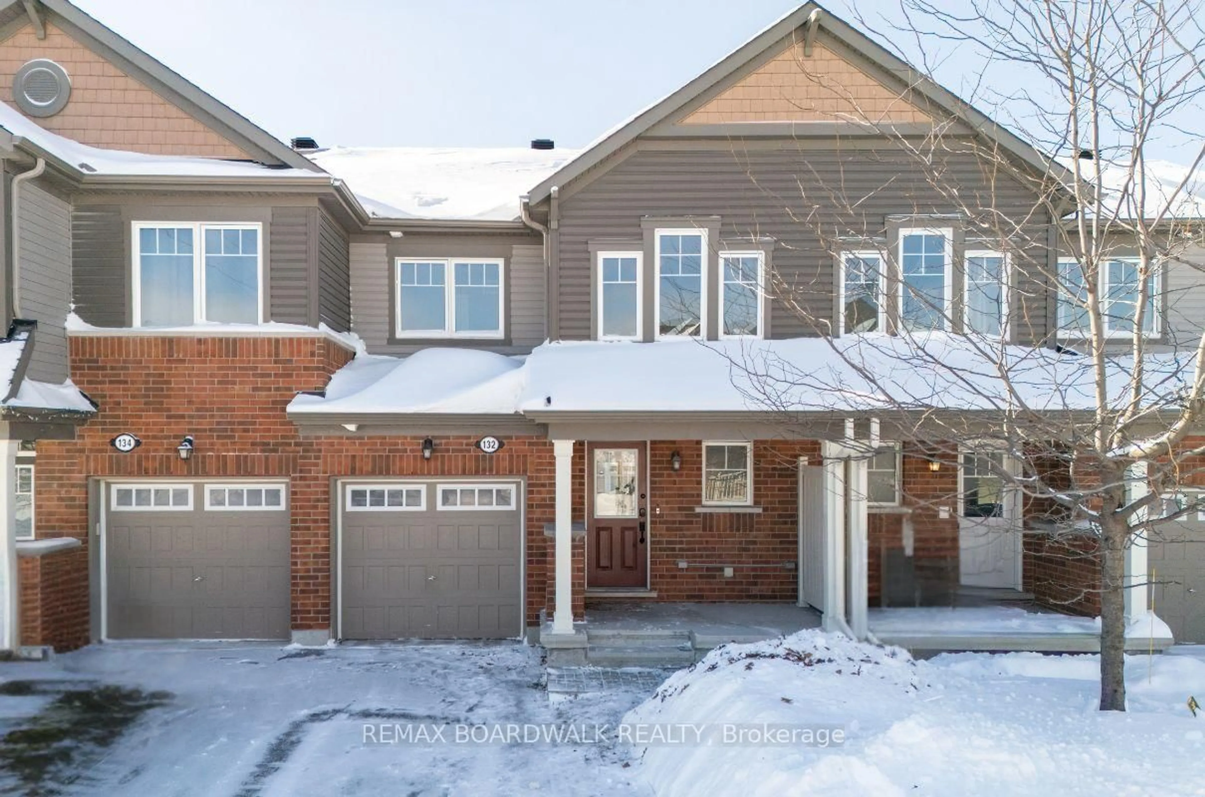 Home with brick exterior material, street for 132 Conifer Creek Circ, Ottawa Ontario K2M 0M2