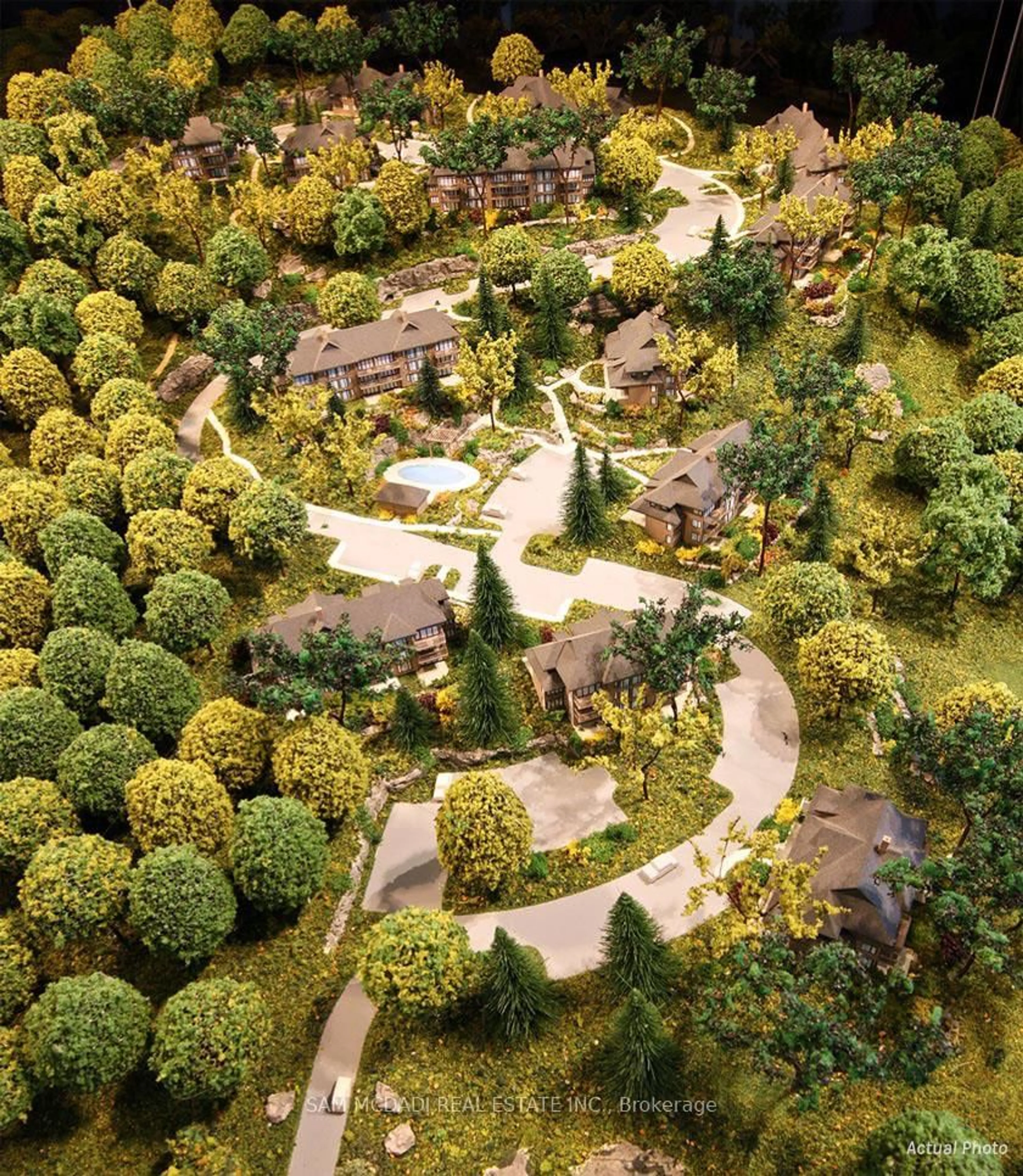 A pic from outside/outdoor area/front of a property/back of a property/a pic from drone, forest/trees view for 2 Tree Tops Lane #102, Huntsville Ontario P1H 0B8