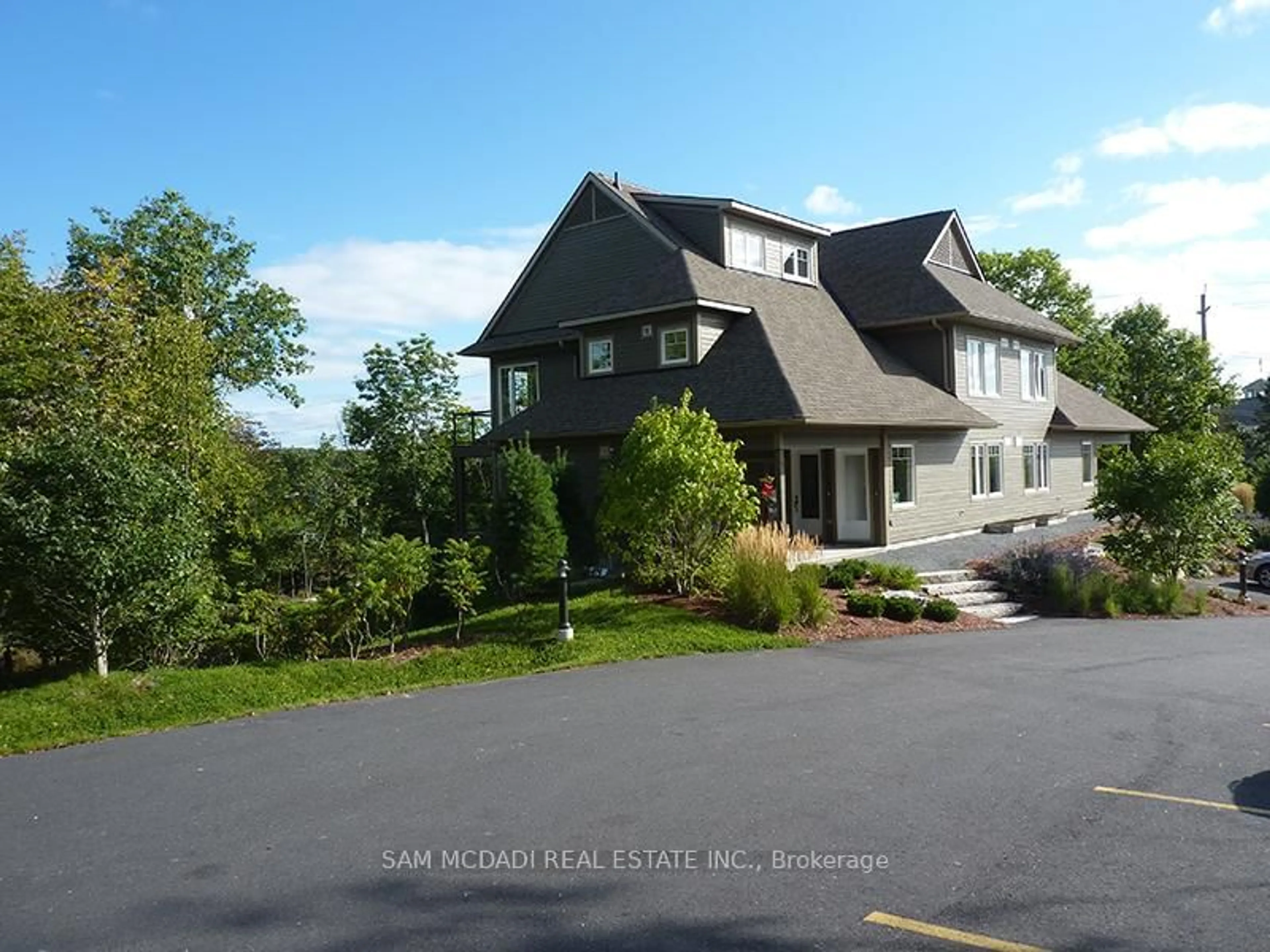 A pic from outside/outdoor area/front of a property/back of a property/a pic from drone, unknown for 2 Tree Tops Lane #102, Huntsville Ontario P1H 0B8