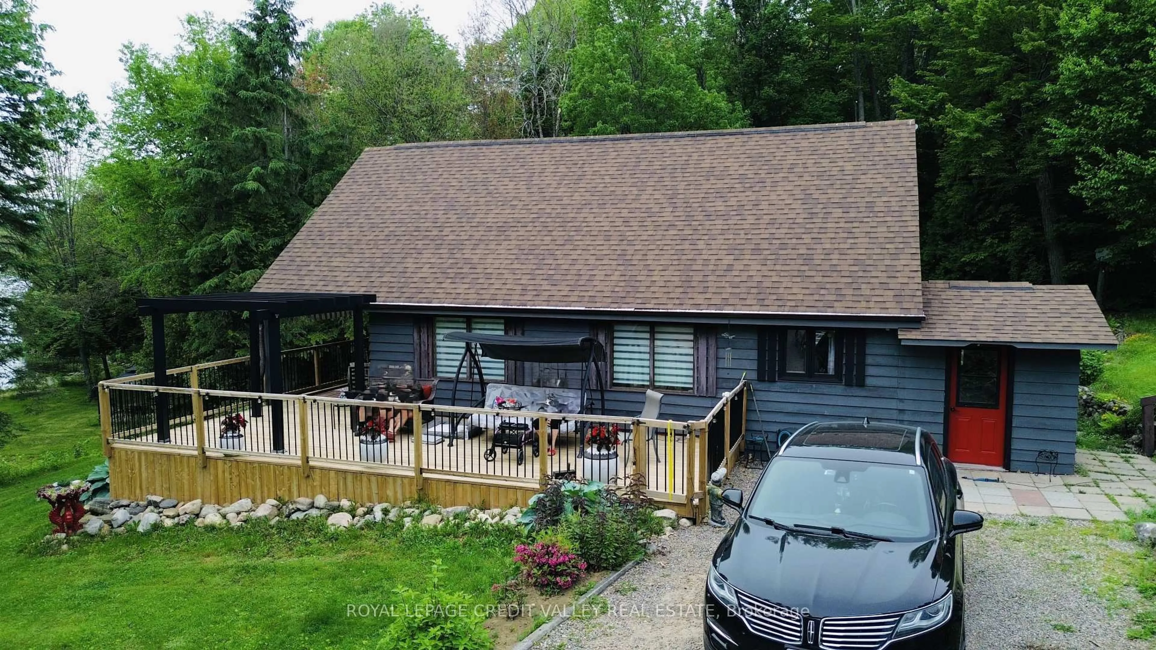 A pic from outside/outdoor area/front of a property/back of a property/a pic from drone, mountain view for 992 South Baptiste Lake Rd, Bancroft Ontario K0L 1C0