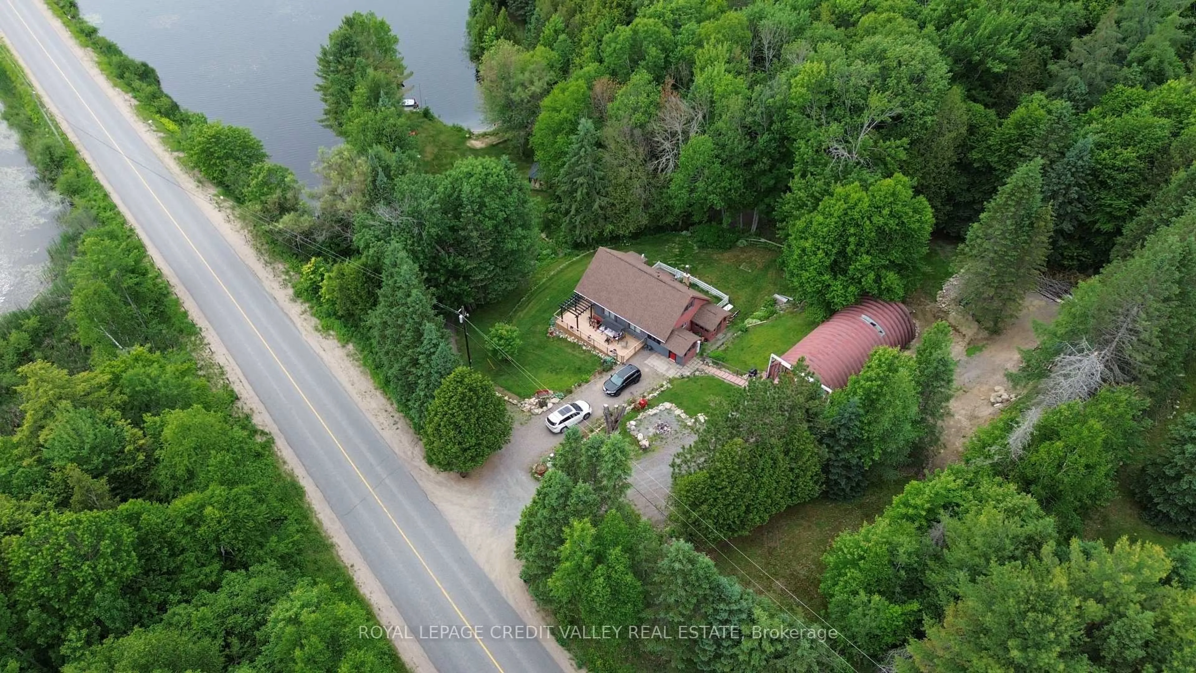 A pic from outside/outdoor area/front of a property/back of a property/a pic from drone, water/lake/river/ocean view for 992 South Baptiste Lake Rd, Bancroft Ontario K0L 1C0