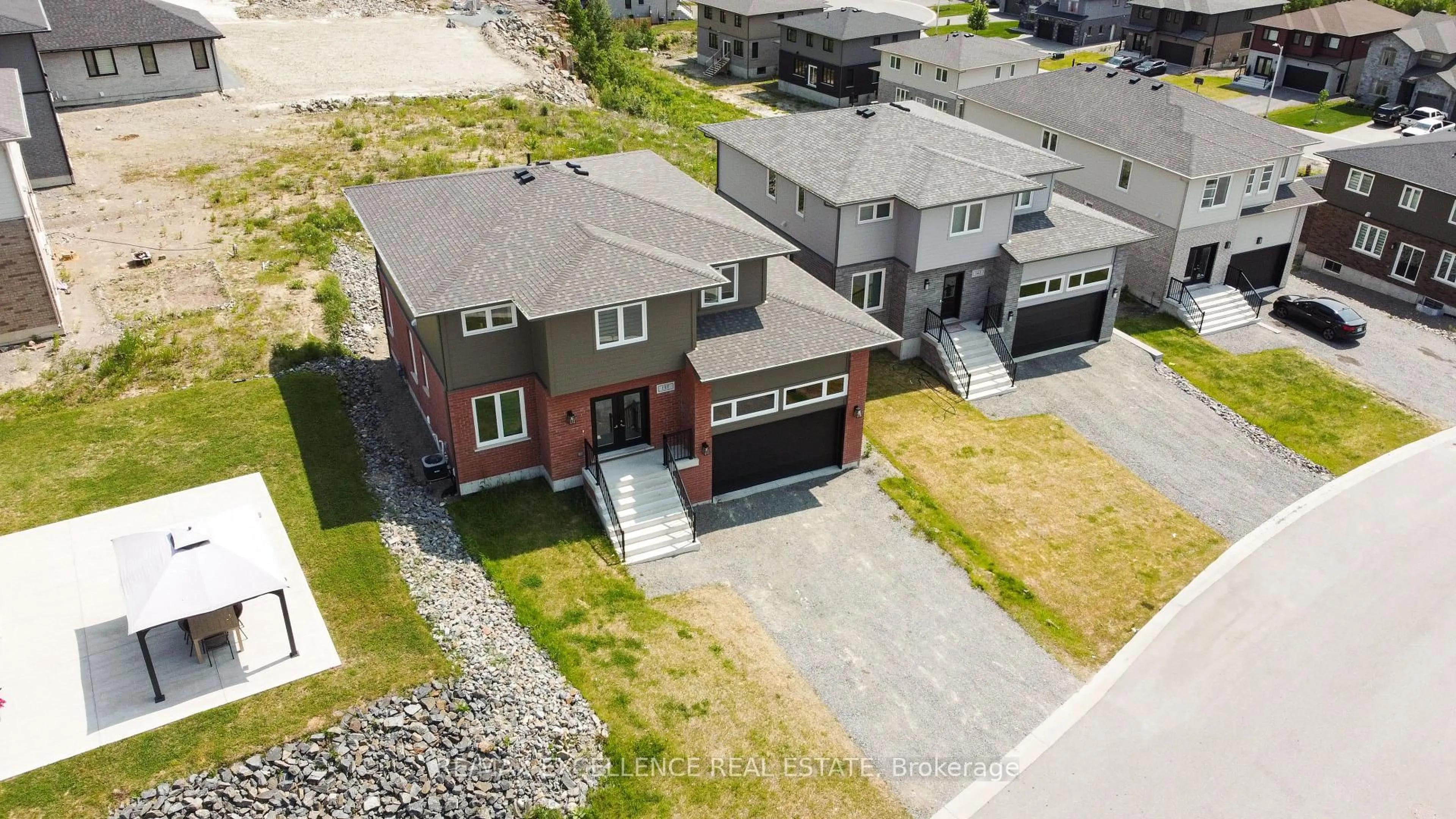 A pic from outside/outdoor area/front of a property/back of a property/a pic from drone, street for 137 Landreville Dr, Sudbury Remote Area Ontario P3A 0B5