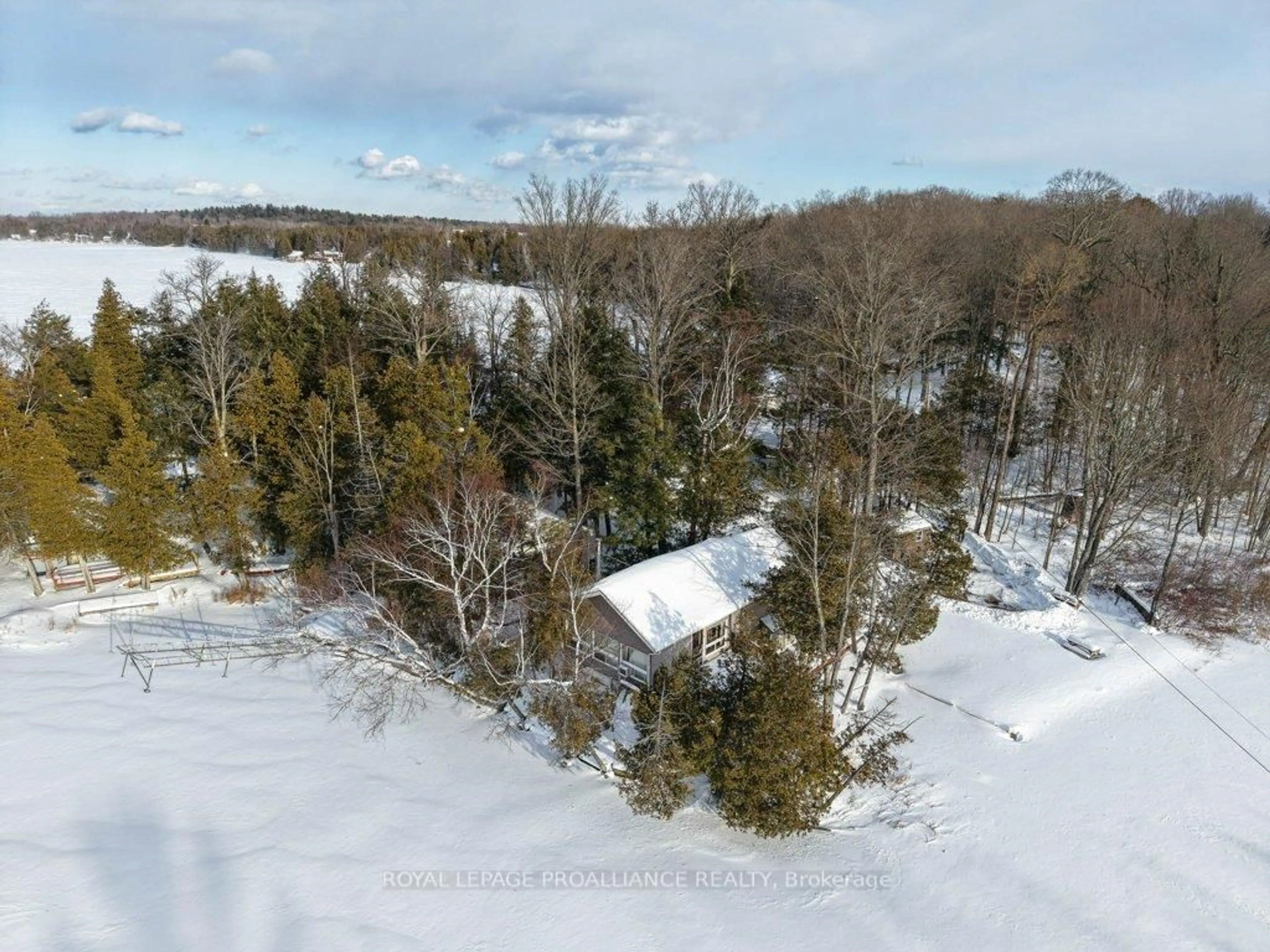 A pic from outside/outdoor area/front of a property/back of a property/a pic from drone, forest/trees view for 24A & 24B Cypress Lane, Stone Mills Ontario K0K 2A0