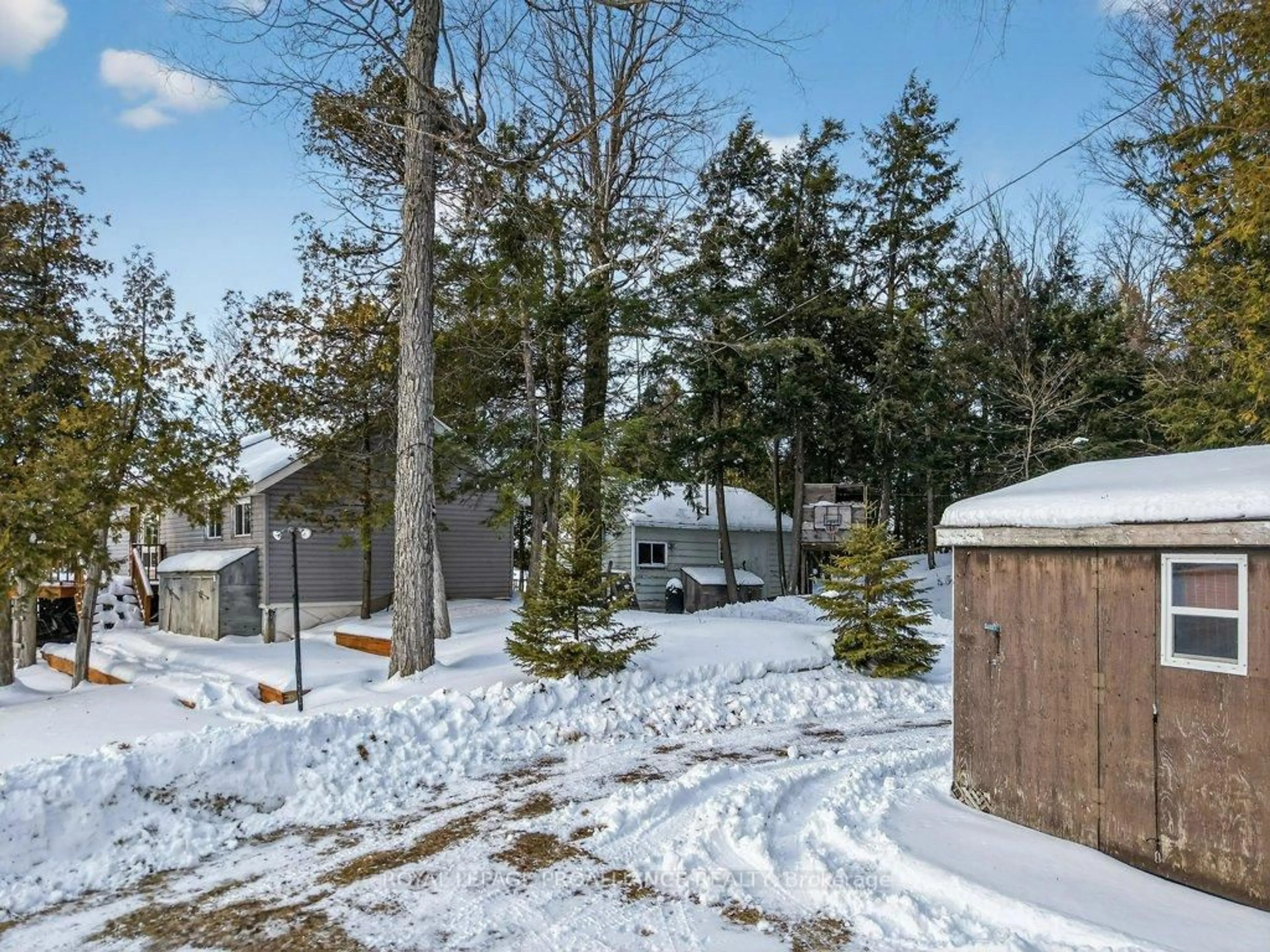A pic from outside/outdoor area/front of a property/back of a property/a pic from drone, forest/trees view for 24A & 24B Cypress Lane, Stone Mills Ontario K0K 2A0