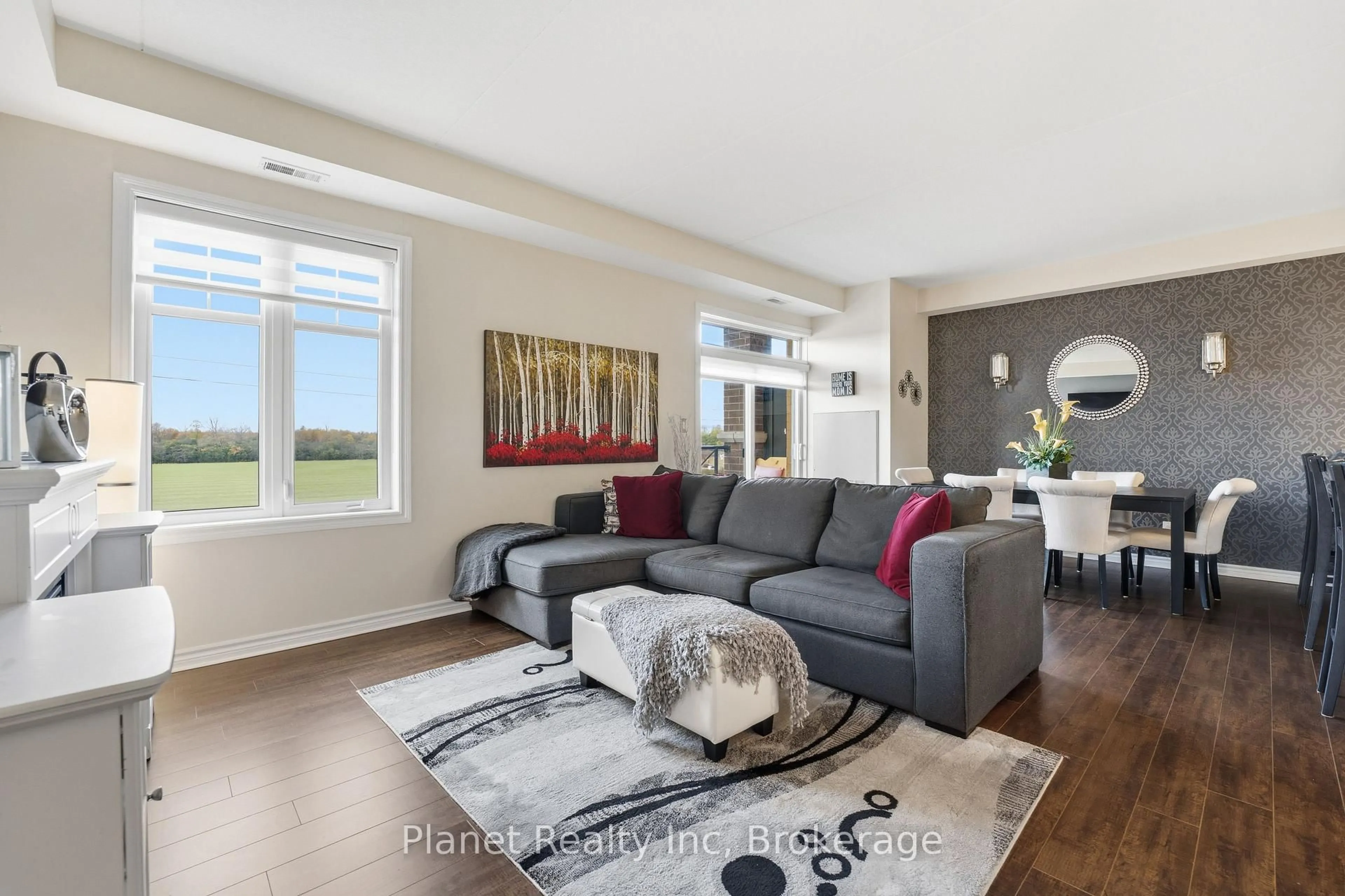 Living room with furniture, unknown for 2 Colonial Dr #204, Guelph Ontario N1L 0K8