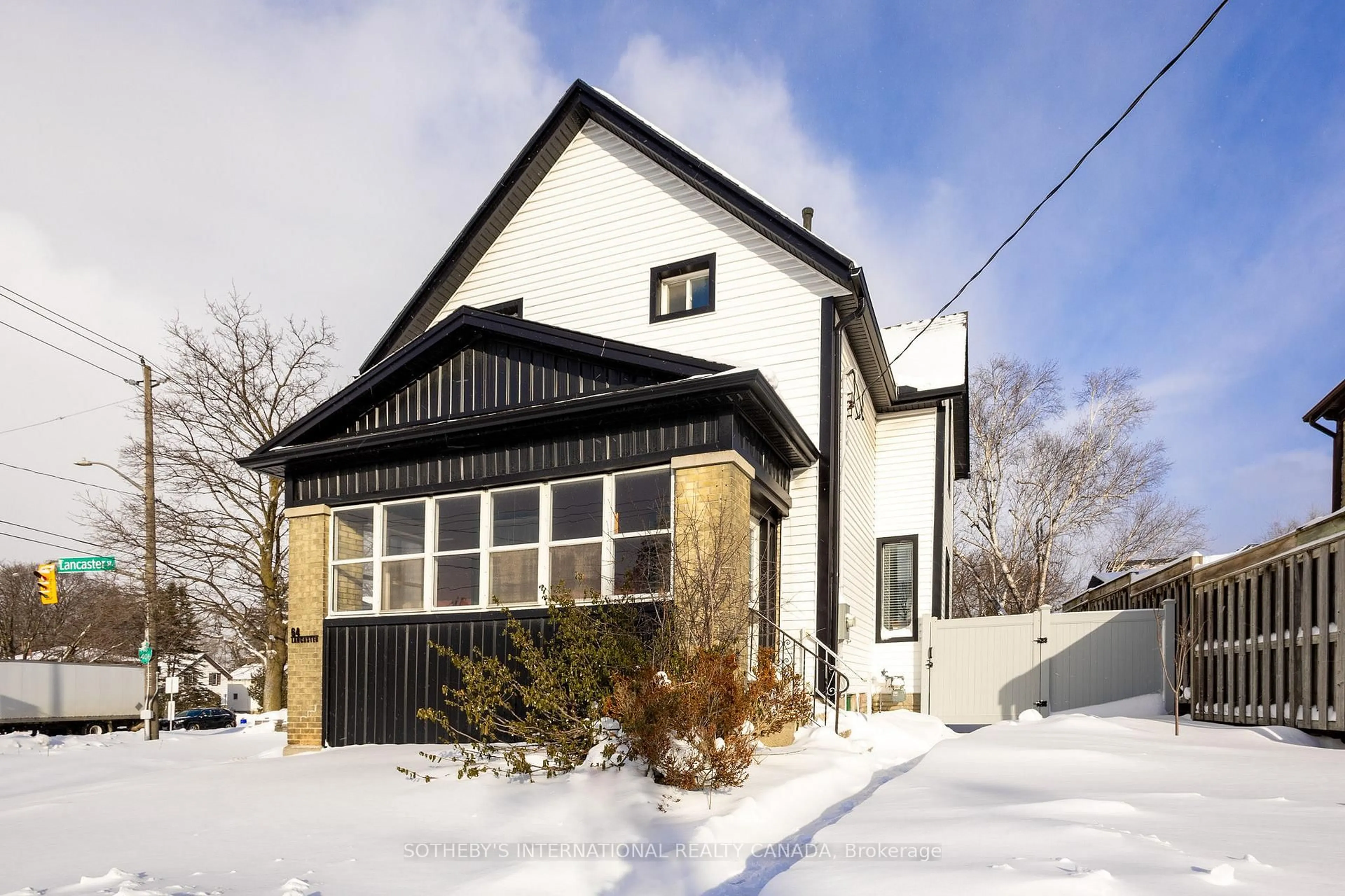 Home with brick exterior material, street for 64 Lancaster Estates, Kitchener Ontario N2H 4T2