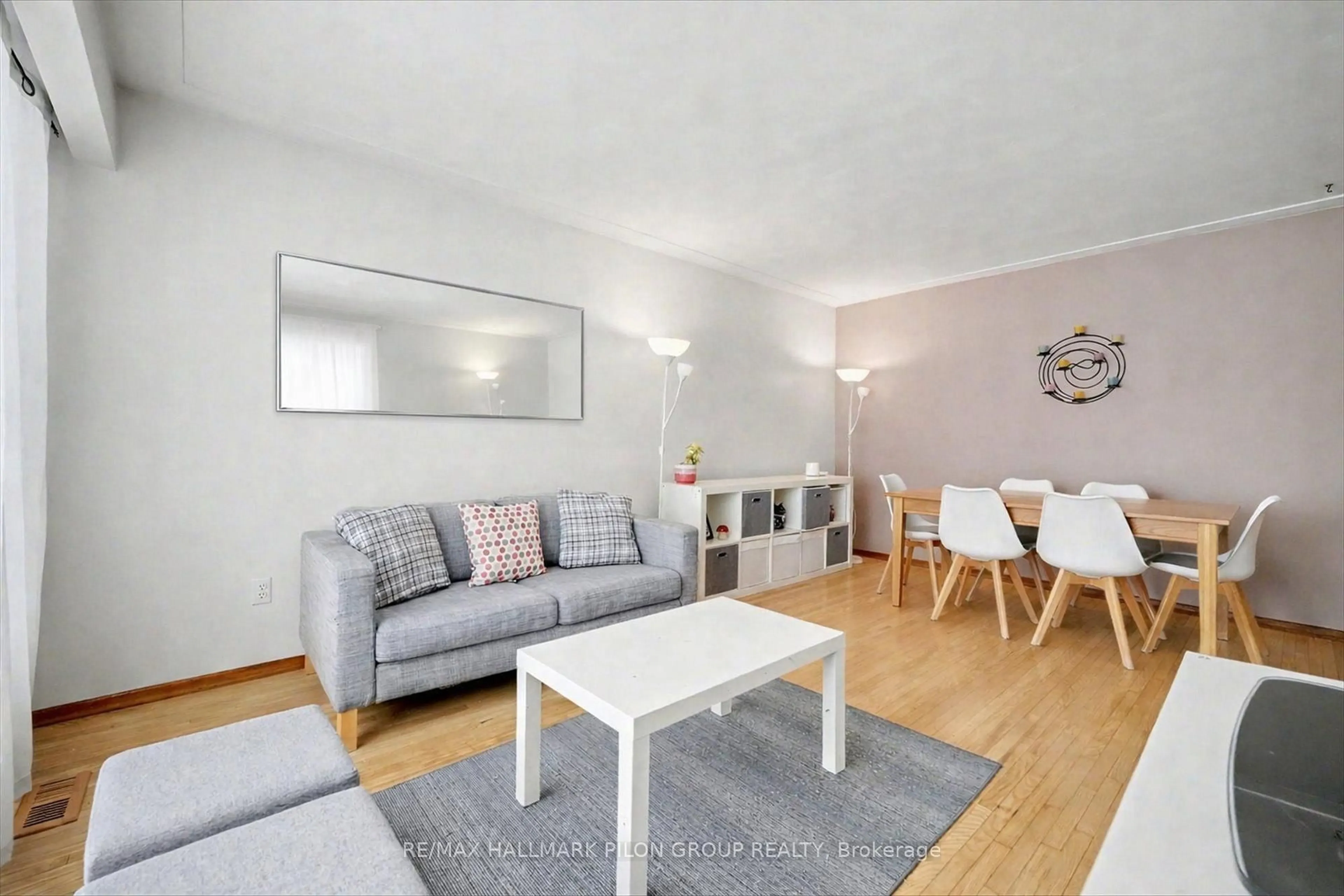 Living room with furniture, wood/laminate floor for 2089 Bangor St, Ottawa Ontario K1G 2X6