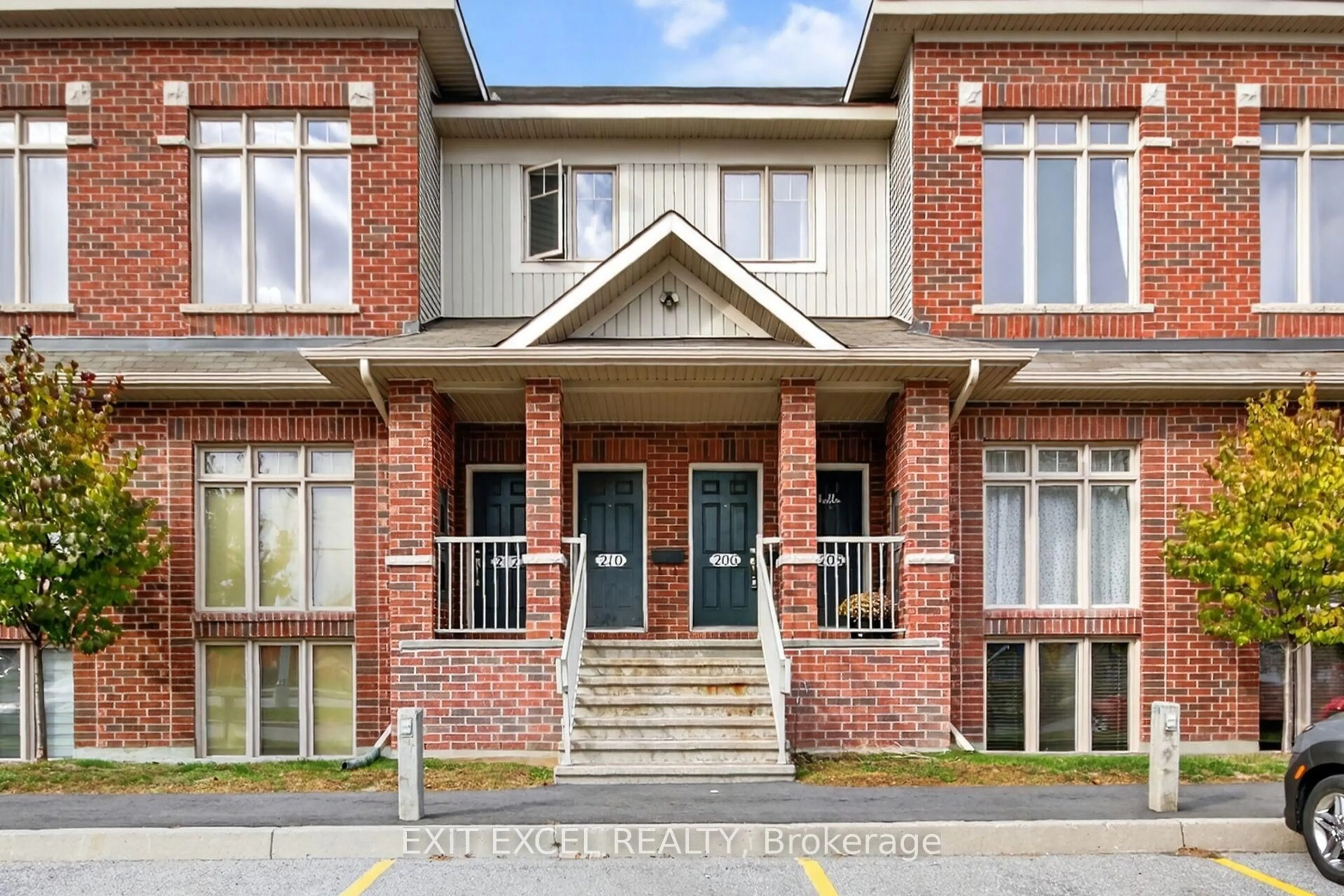 Home with brick exterior material, street for 206 Keltie Private, Ottawa Ontario K2J 0A2