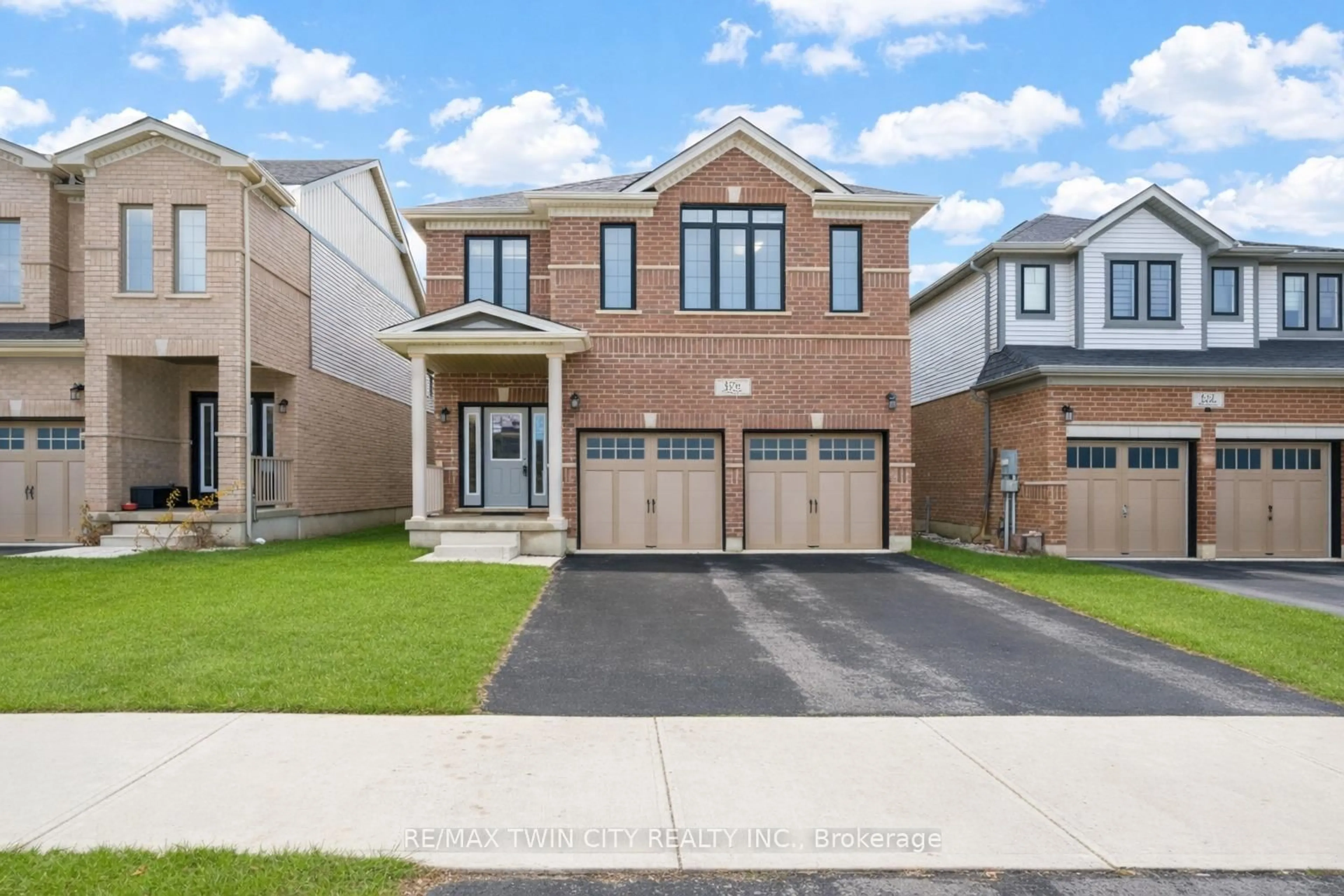 Home with brick exterior material, street for 126 Tartan Ave, Kitchener Ontario N2R 0N4