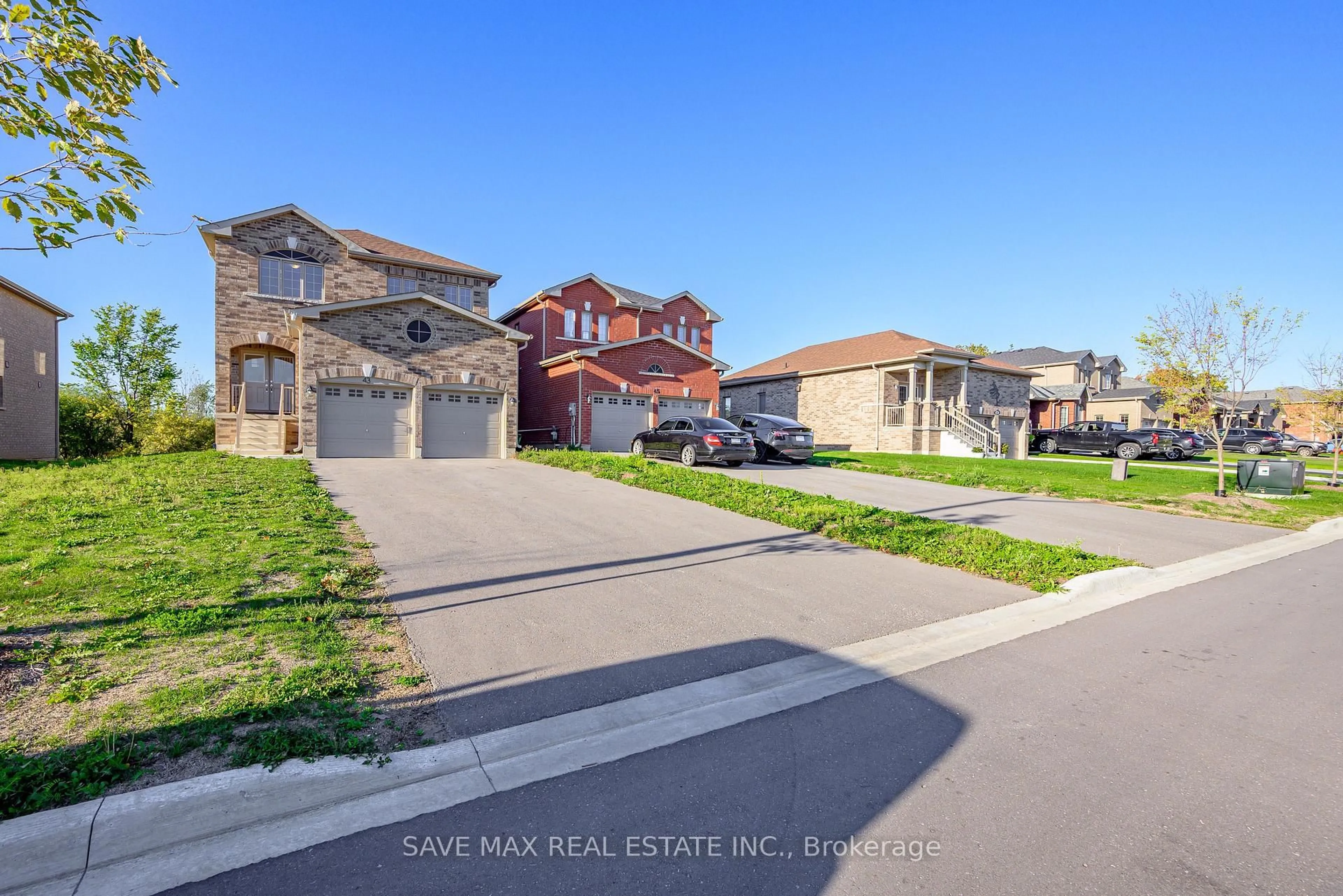 A pic from outside/outdoor area/front of a property/back of a property/a pic from drone, street for 43 Carew Blvd, Kawartha Lakes Ontario K9V 0P7