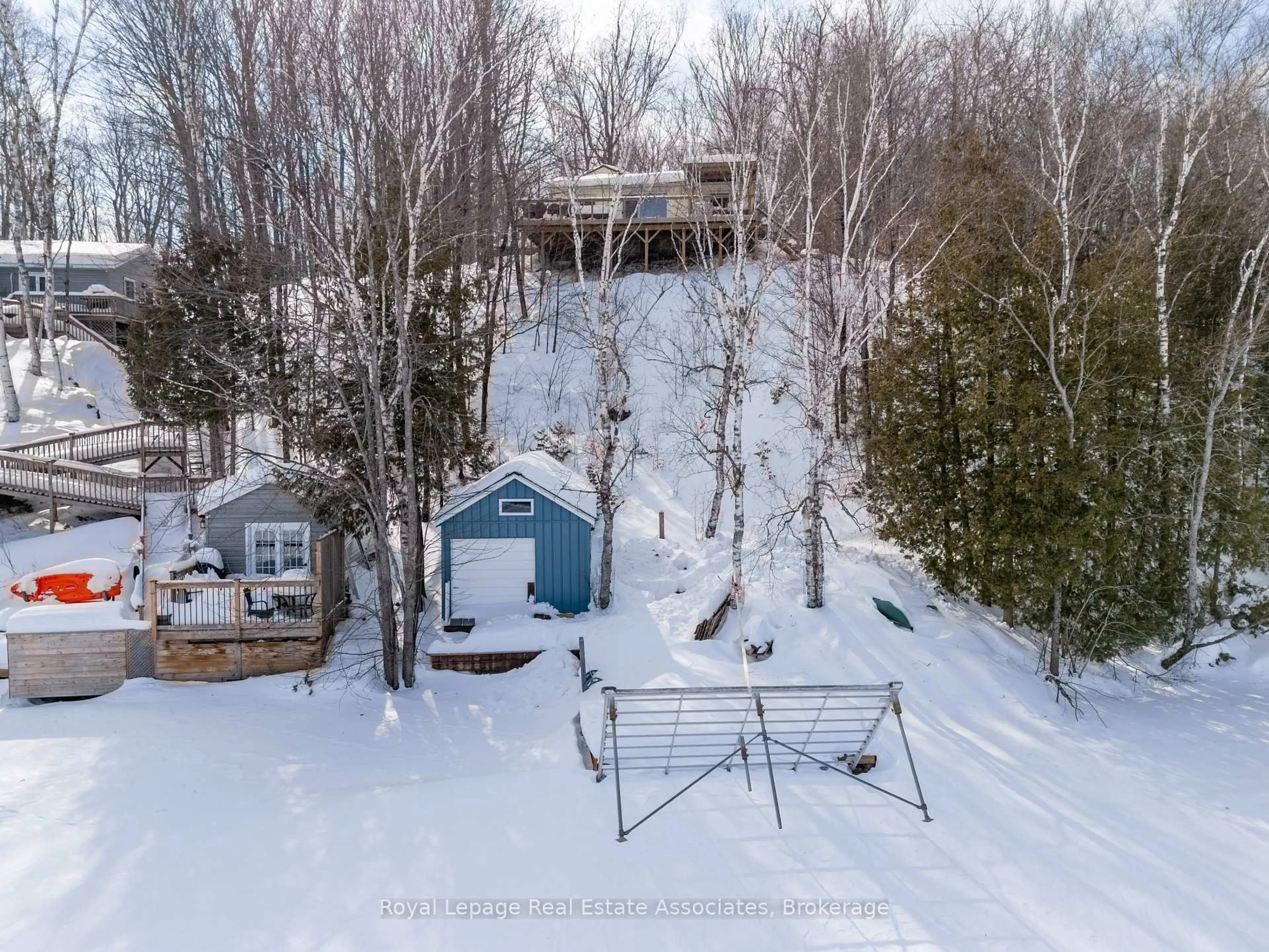 A pic from outside/outdoor area/front of a property/back of a property/a pic from drone, unknown for 398 Gilbert Bay Lane, Coe Hill Ontario K0L 1P0