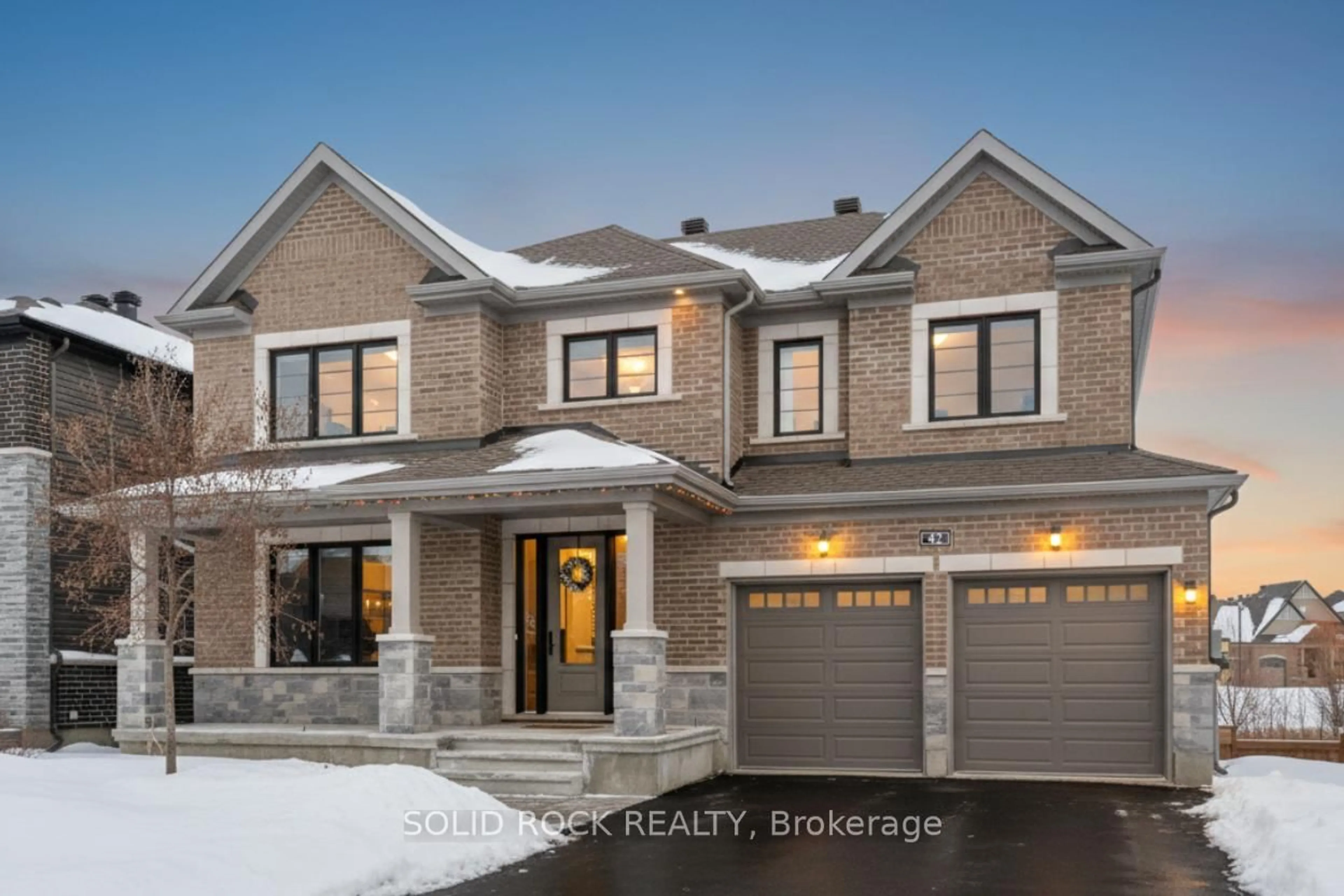 Home with brick exterior material, street for 42 Conch Way, Manotick Ontario K4M 0M4