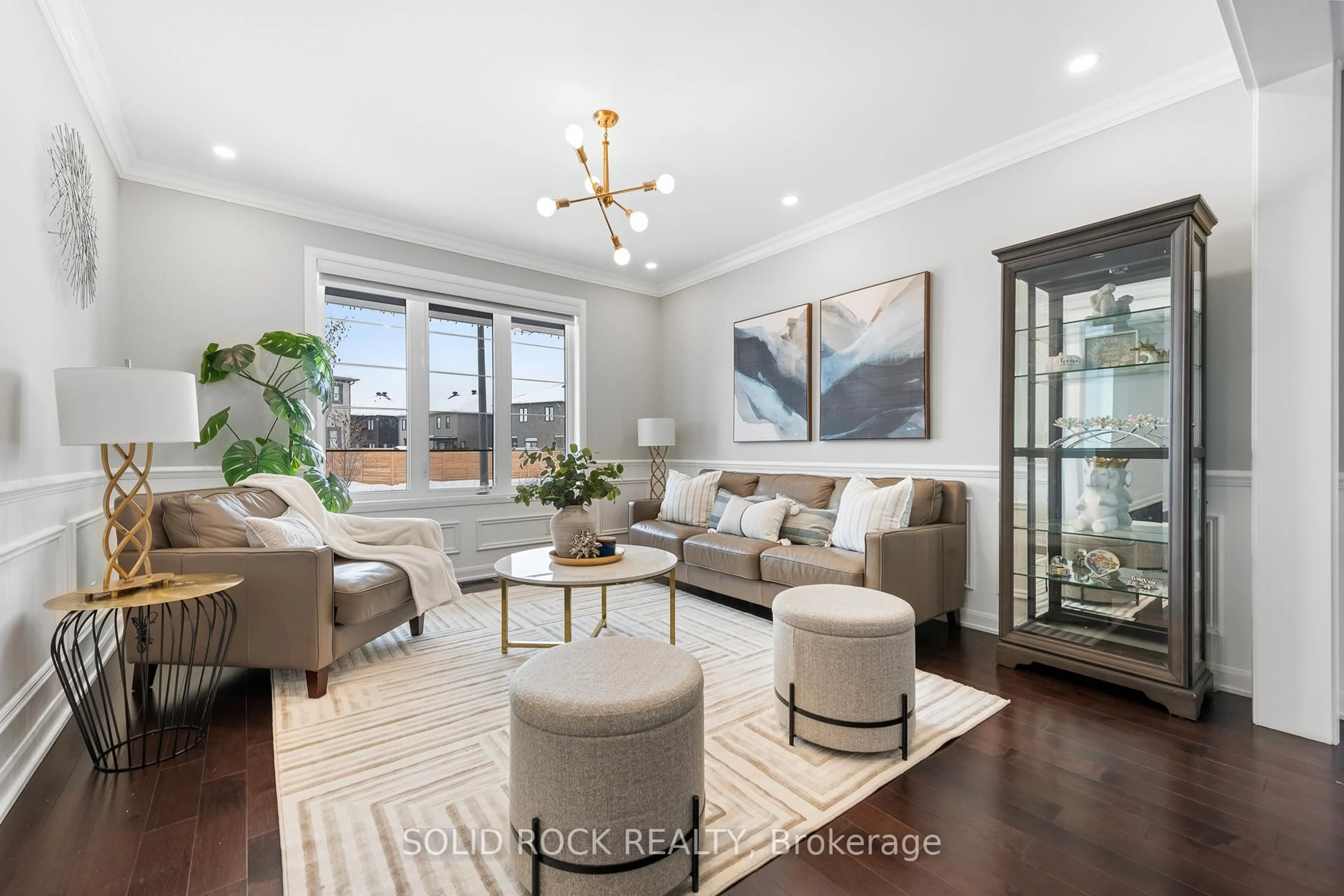 Living room with furniture, wood/laminate floor for 42 Conch Way, Manotick Ontario K4M 0M4