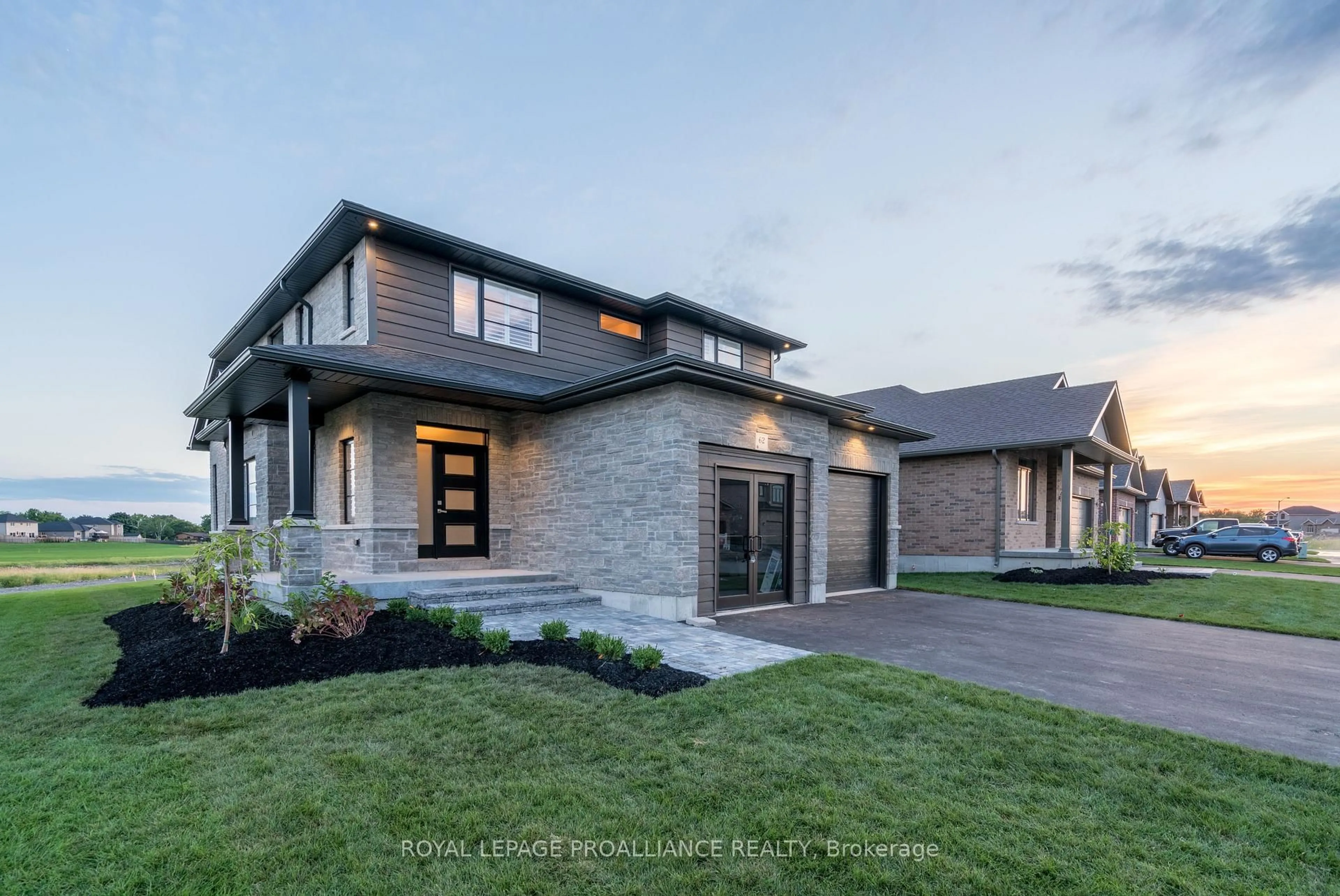 Home with brick exterior material, street for 62 HAMPTON RIDGE Dr, Belleville Ontario K8N 0E5