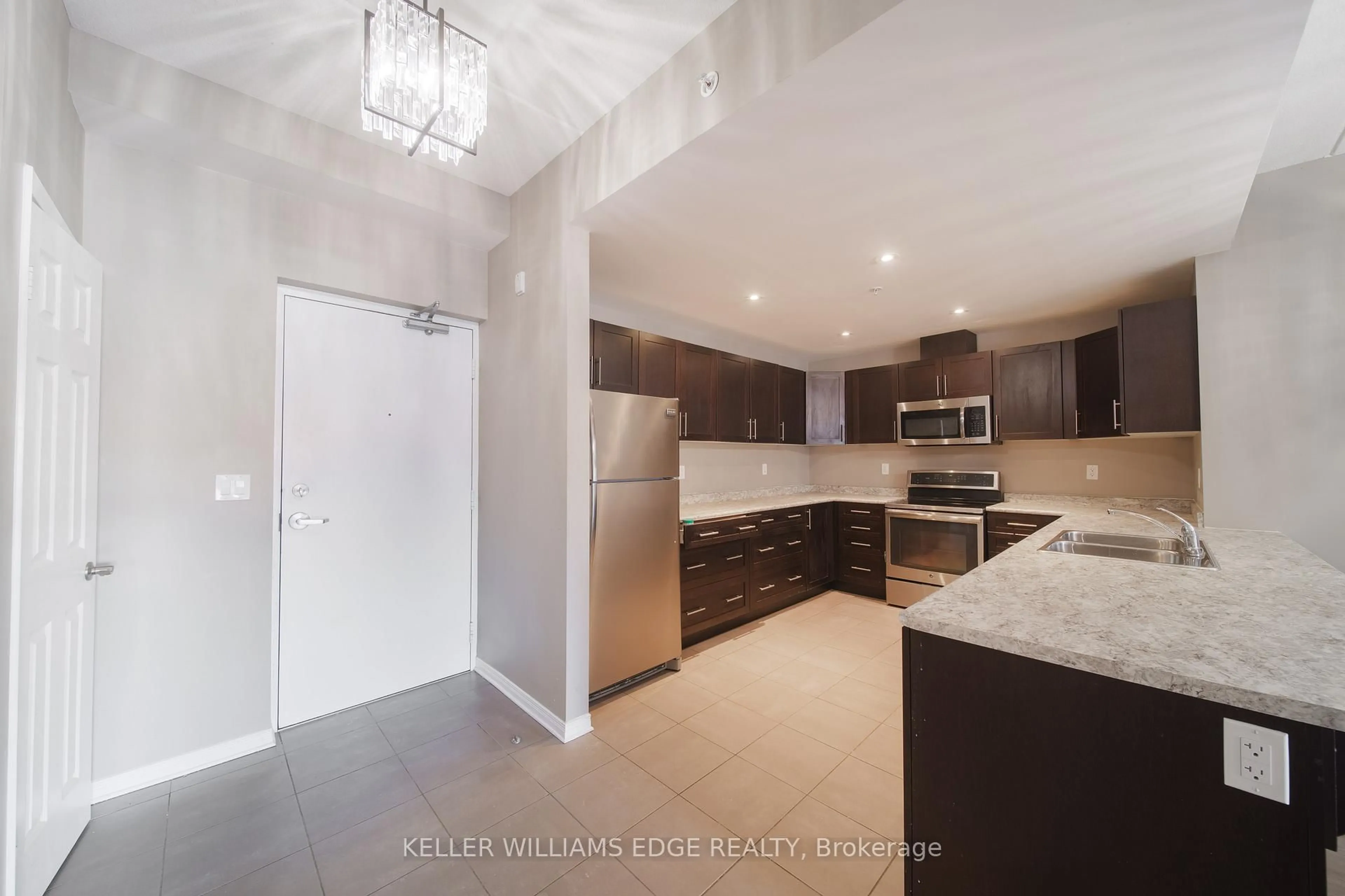 Open concept kitchen, unknown for 16 Sullivan Ave #105, Thorold Ontario L2V 2Y2