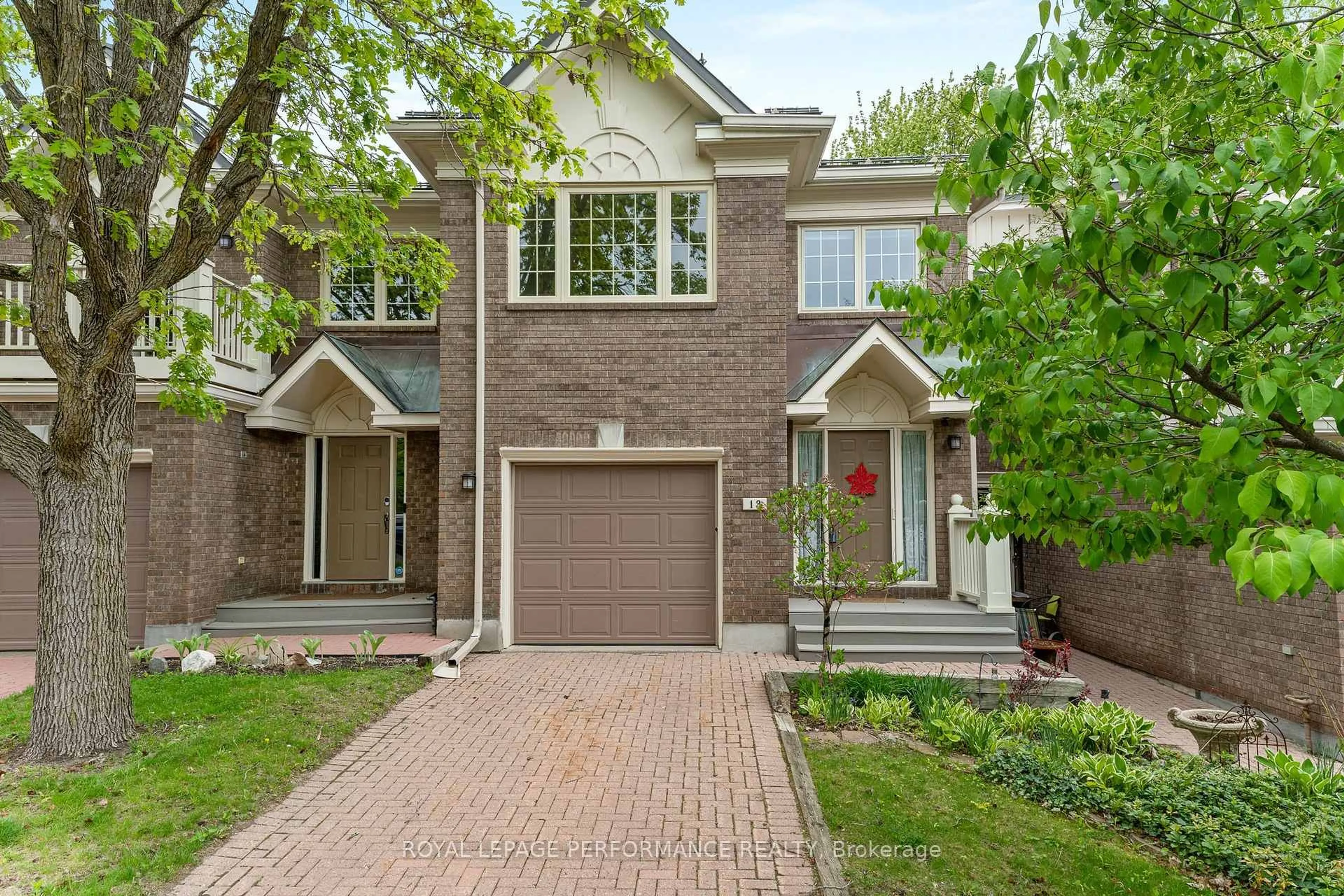 Home with brick exterior material, street for 13 Waterford Way, Ottawa Ontario K2E 7V4