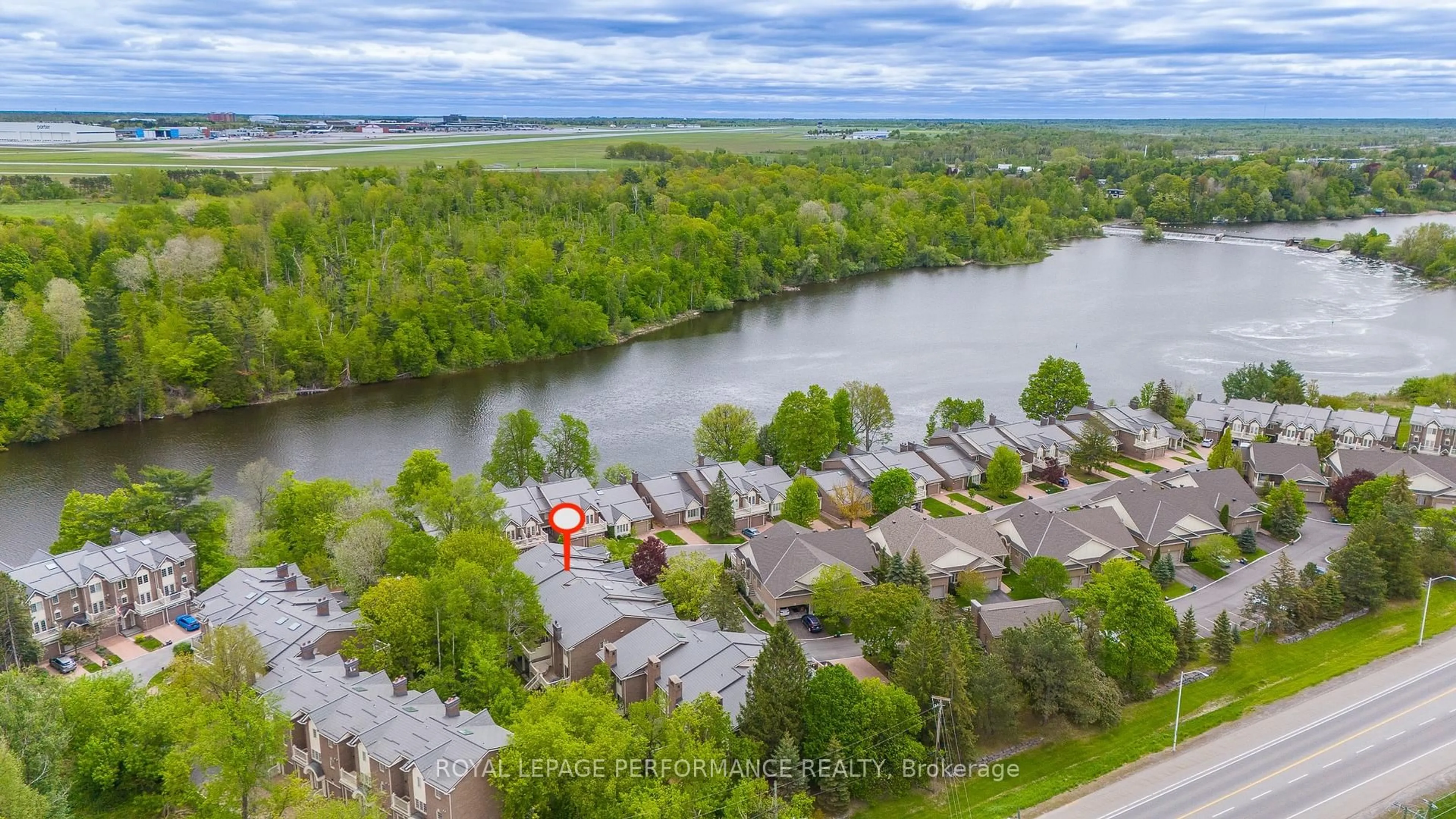 A pic from outside/outdoor area/front of a property/back of a property/a pic from drone, water/lake/river/ocean view for 13 Waterford Way, Ottawa Ontario K2E 7V4